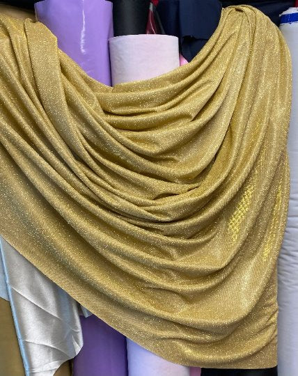 gold stretch metallic lurex, gold stretch metallic lurex for woman, dusty gold stretch metallic lurex, party wear gold stretch metallic lurex, shiny lurex, stretch metallic lurex for bride, lurex on discount, lurex on sale, buy metallic lurex online, lurex for gown
