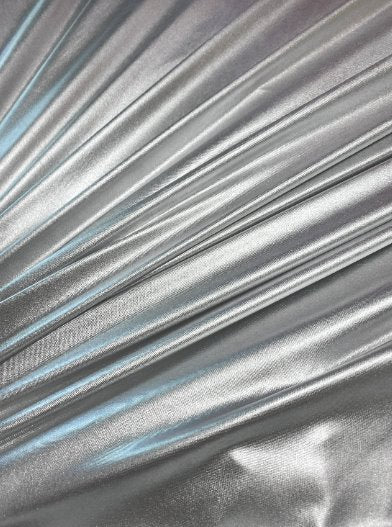 Silver Slinky Foiled Jersey, dark silver Slinky Foiled Jersey, light silver Slinky Foiled Jersey, grey Slinky Foiled Jersey for woman, Slinky Foiled Jersey for bride, Slinky Foiled Jersey on discount, Slinky Foiled Jersey on sale, premium Slinky Foiled Jersey, kiki textile Slinky Foiled Jersey, Slinky Foiled Jersey for party wear, Slinky Foiled Jersey for winter