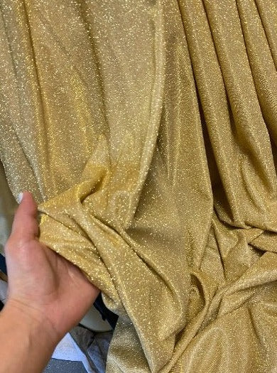 gold stretch metallic lurex, gold stretch metallic lurex for woman, dusty gold stretch metallic lurex, party wear gold stretch metallic lurex, shiny lurex, stretch metallic lurex for bride, lurex on discount, lurex on sale, buy metallic lurex online, lurex for gown