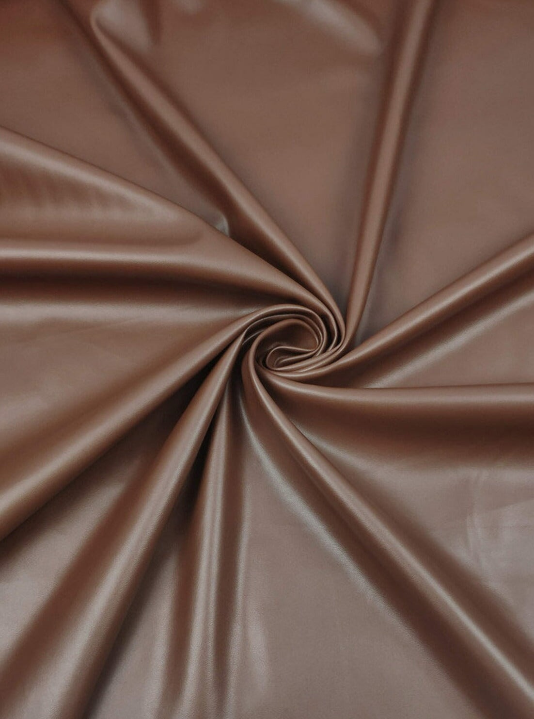 Chocolate stretch faux leather, Chocolate stretch pleather, Chocolate stretch soft vinyl, Chocolate stretch vinyl, faux leather stretch for clothing, Faux Leather for jackets, Faux Leather for bags, Faux Leather on discount, Faux Leather on sale, premium Faux Leather, dark brown Faux Leather, brown Faux Leather, Faux Leather for tops, Faux Leather for leggings