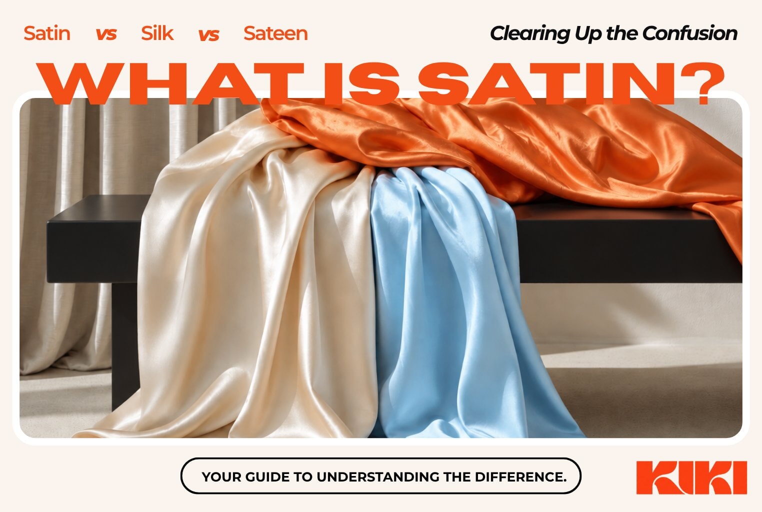 Close-up of draped ivory satin fabric showing its glossy front and matte reverse