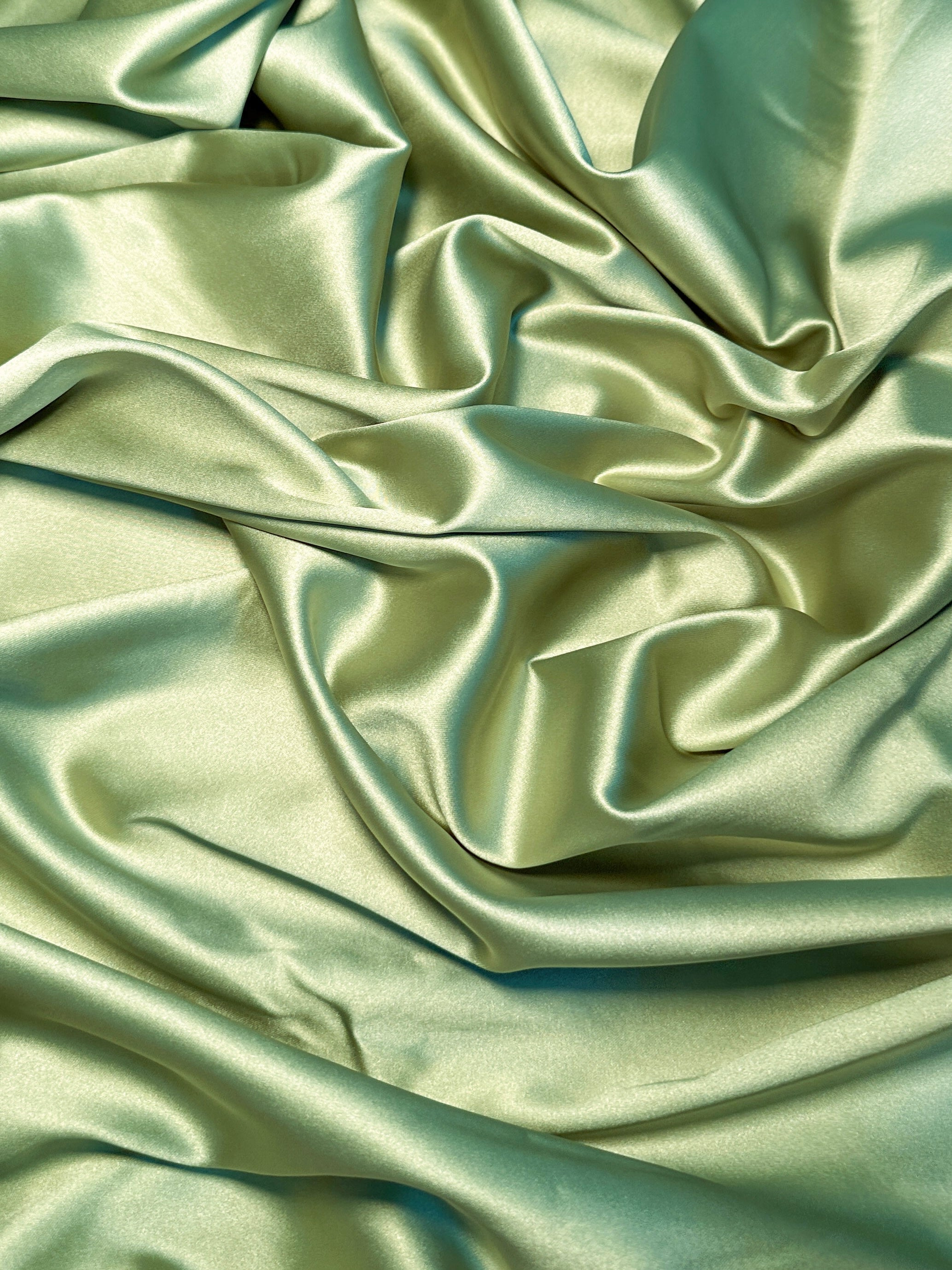  pistachio stretch crepe back satin, light green stretch crepe back satin, green stretch crepe back satin, premium stretch crepe back satin, satin for bride, satin for woman, satin in low price, cheap satin, satin on sale