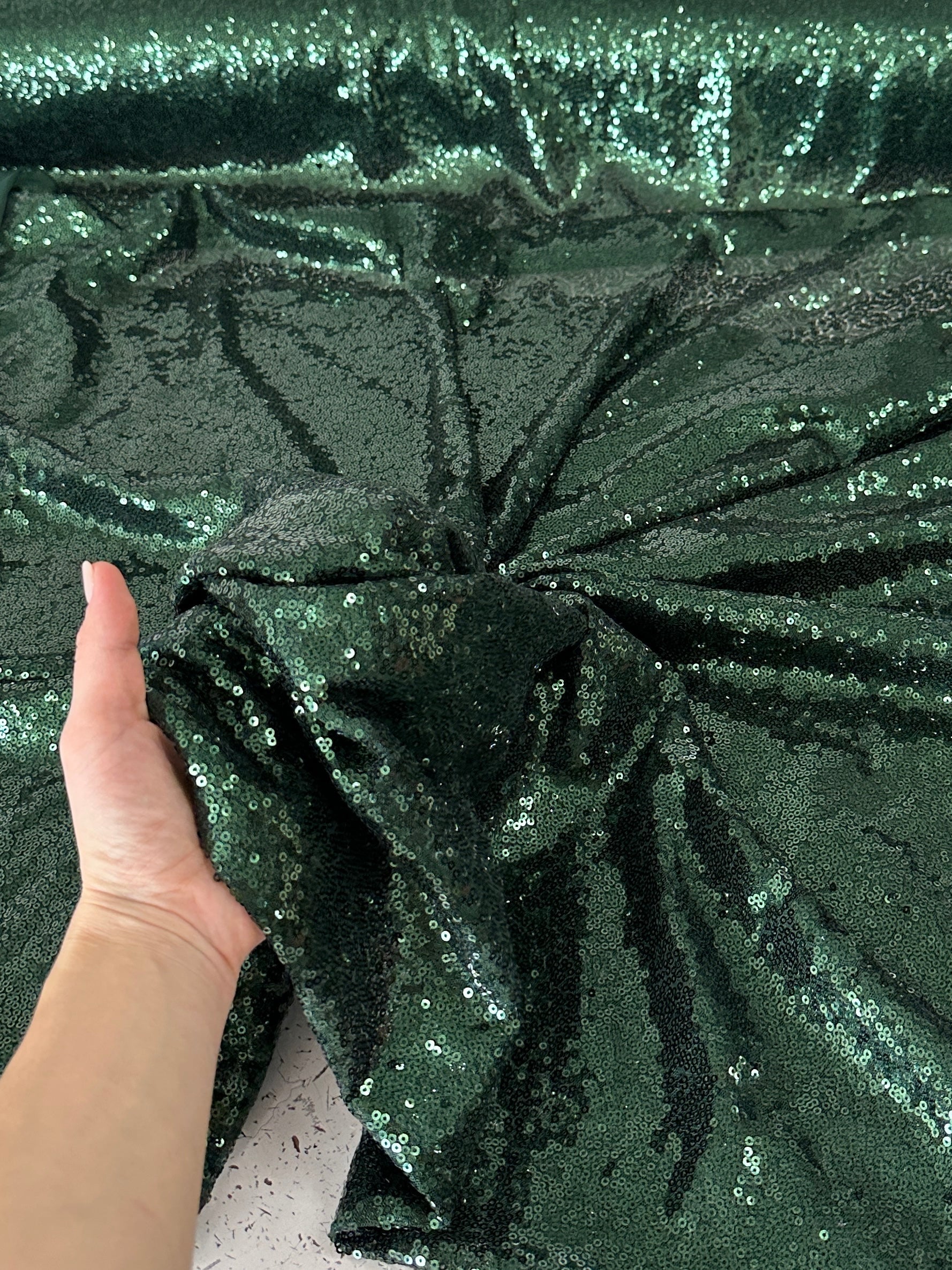 Hunter green sequins on mesh, light green sequins on mesh, green sequin on mesh, dark green sequin on mesh for woman, sequin on mesh for bride, sequin on mesh on discount, sequin on mesh on sale, premium sequin on mesh, kiki textile sequin on mesh, sequin on mesh for party wear