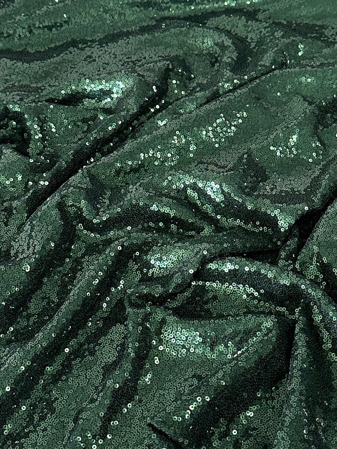 Hunter green sequins on mesh, light green sequins on mesh, green sequin on mesh, dark green sequin on mesh for woman, sequin on mesh for bride, sequin on mesh on discount, sequin on mesh on sale, premium sequin on mesh, kiki textile sequin on mesh, sequin on mesh for party wear