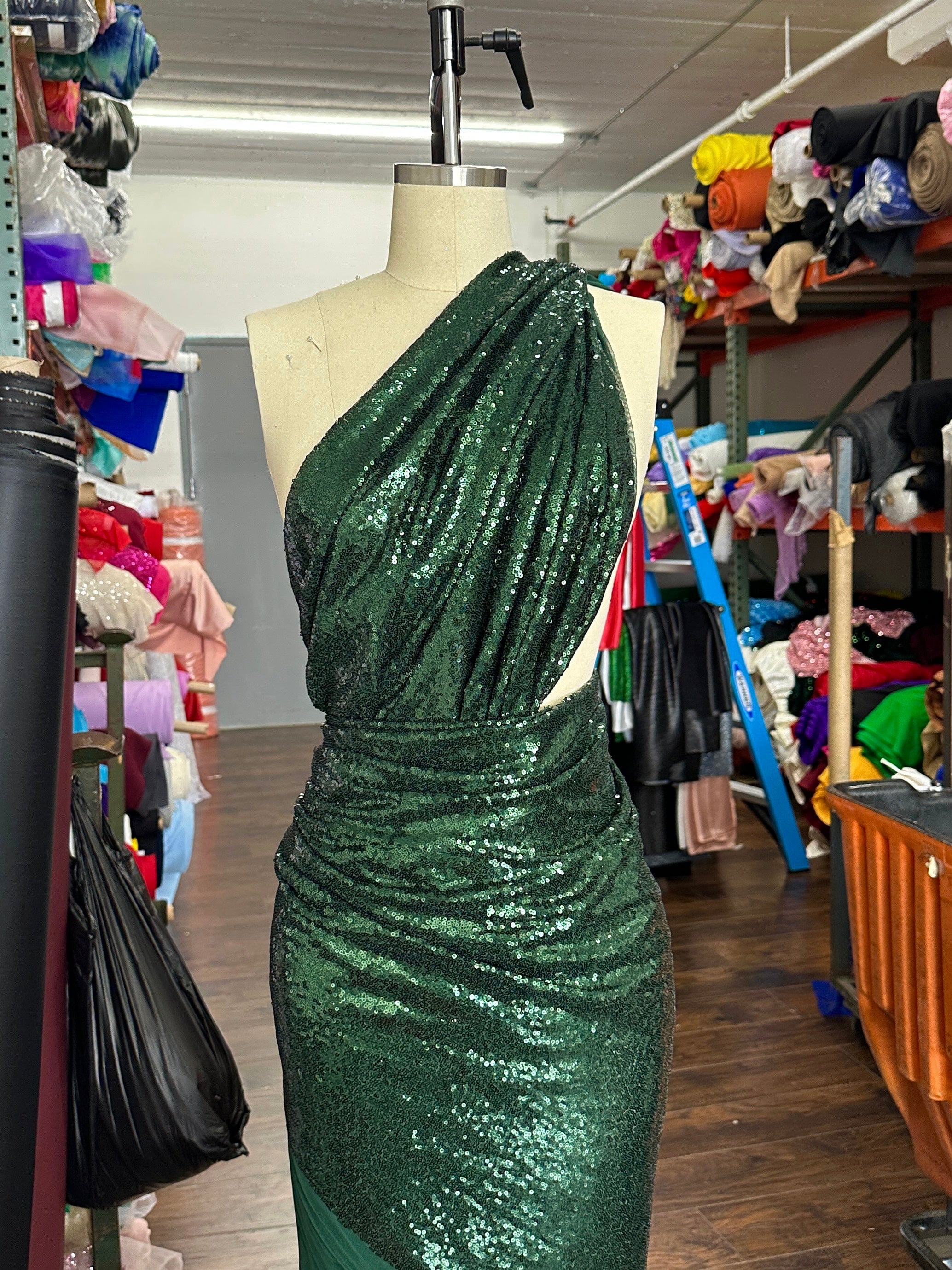 Hunter green sequins on mesh, light green sequins on mesh, green sequin on mesh, dark green sequin on mesh for woman, sequin on mesh for bride, sequin on mesh on discount, sequin on mesh on sale, premium sequin on mesh, kiki textile sequin on mesh, sequin on mesh for party wear