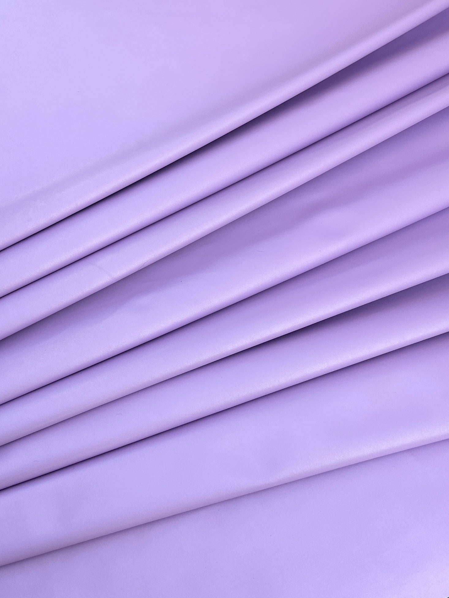 lavender stretch faux leather, stretch faux leather on sale, stretch faux leather on discount, stretch faux leather for woman,stretch faux leather for brazzer, purple stretch faux leather, light purple stretch faux leather, stretch faux leather for winter, stretch faux leather on demand, premium quality stretch faux leather