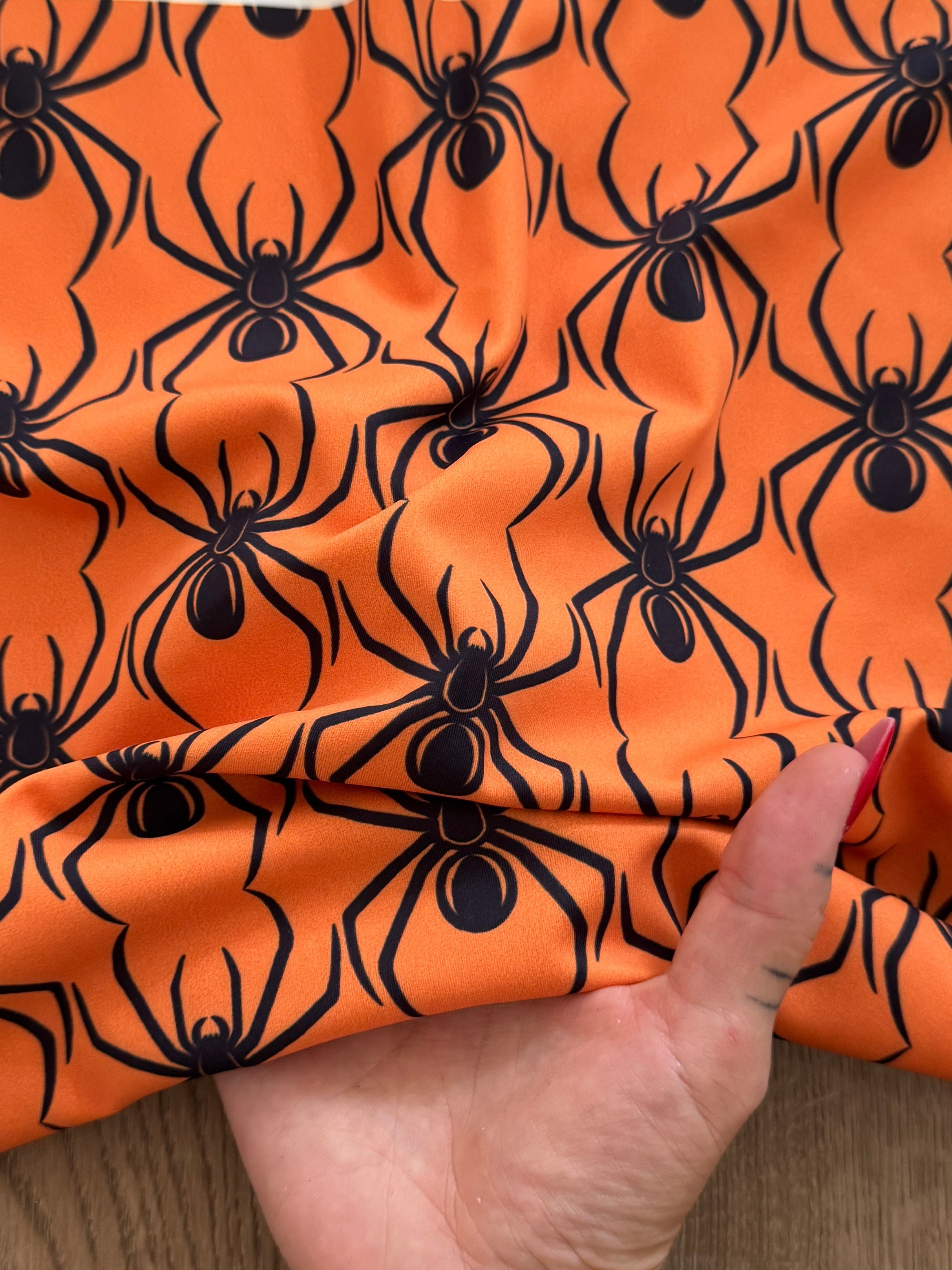 Black on Orange Spider Print Nylon Spandex, Kiki Sewing Store, Kiki Luxury Fabric, Cheap Fabric Store, Kiki Textiles, Kiki Textile by the Yard, Kiki Textile USA