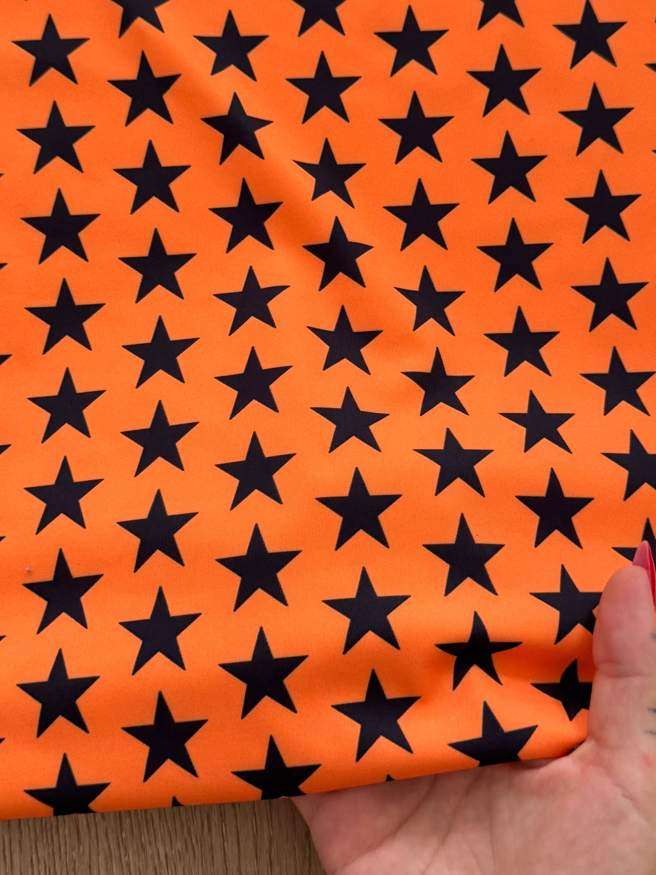 Black on Orange Mini Stars Print Nylon Spandex, Kiki Sewing Store, Kiki Luxury Fabric, Cheap Fabric Store, Kiki Textiles, Kiki Textile by the Yard, Kiki Textile USA