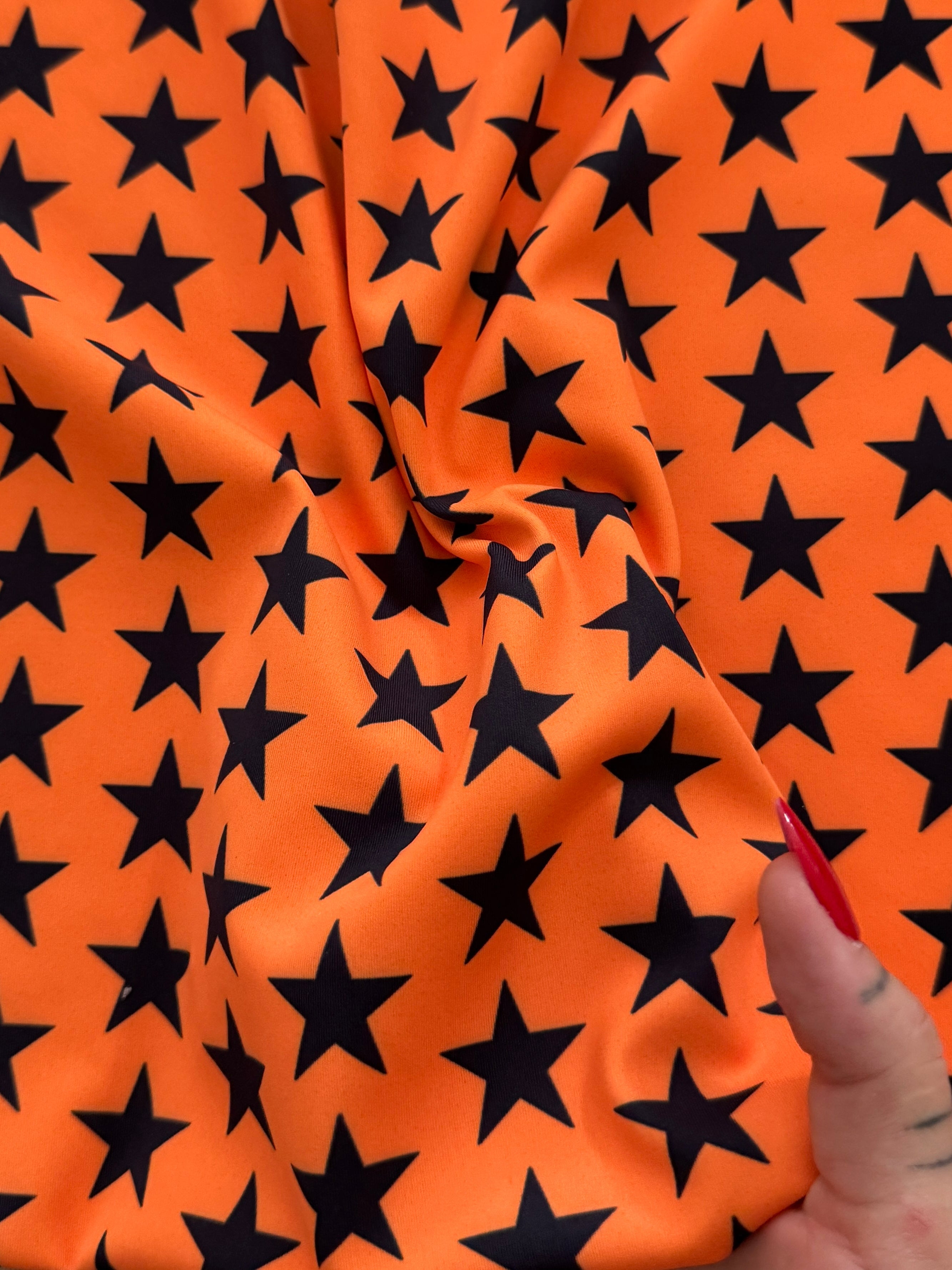 Black on Orange Mini Stars Print Nylon Spandex, Kiki Sewing Store, Kiki Luxury Fabric, Cheap Fabric Store, Kiki Textiles, Kiki Textile by the Yard, Kiki Textile USA