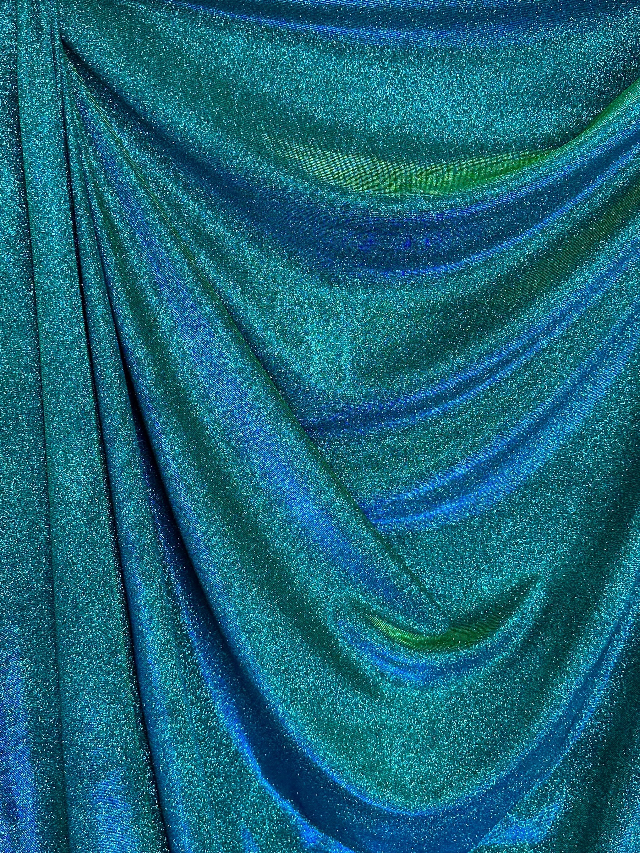 teal iridescent metallic lurex, teal blue lurex, teal green lurex fabric, lurex fabric by the yard, teal material, fabric store, luxury fabrics, cheap fabric, glittery fabric, sparkle fabric, glimmery fabric, shimmery fabric