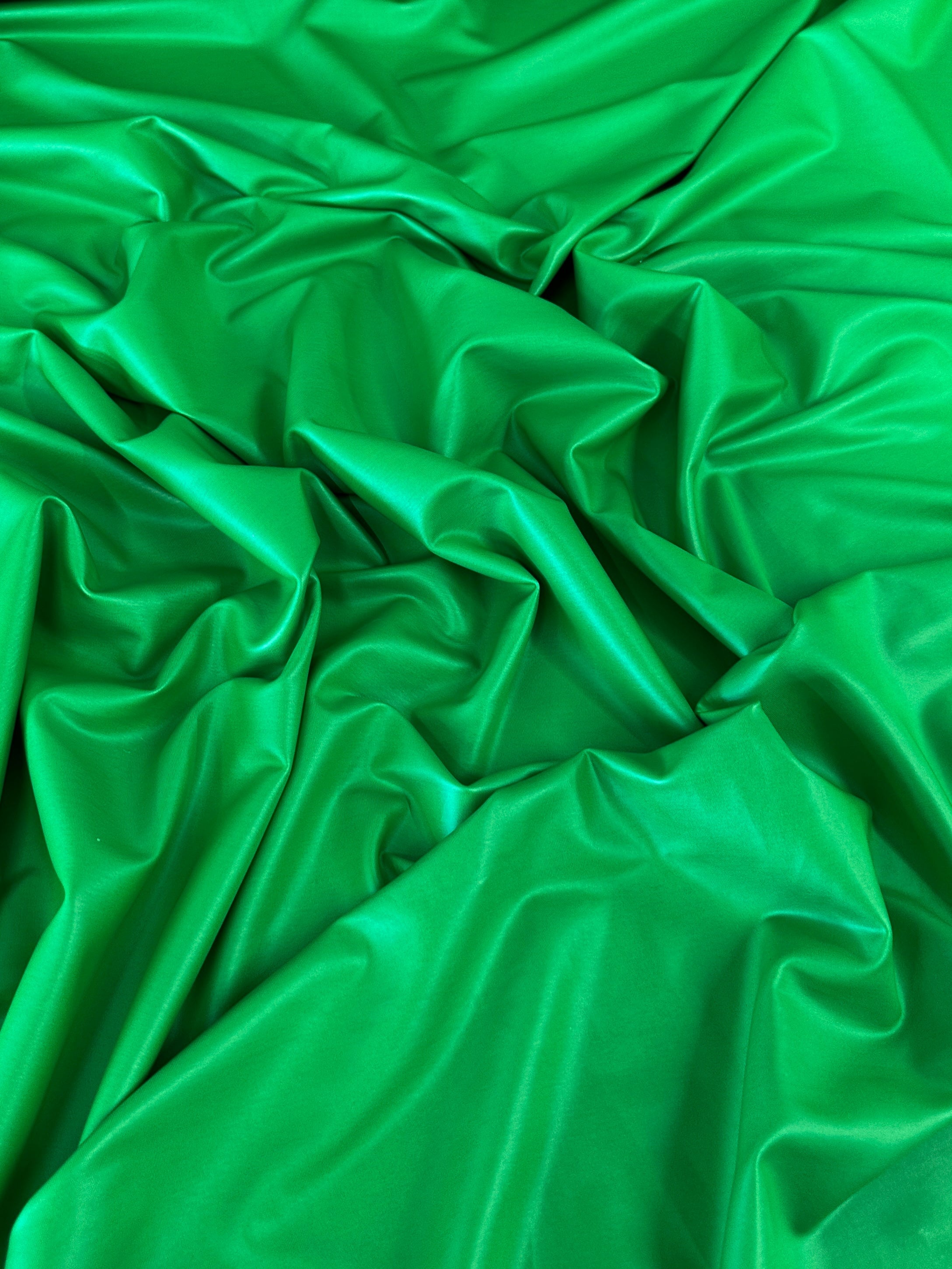 kelly green all way Stretch Faux Leather, green all way stretch leather, shiny faux leather, light green all way stretch faux leather for woman, faux leather for costumes, faux leather for home decor, 2 way stretch faux leather, leather for blazers, cheap leather, discounted leather, leather on sale