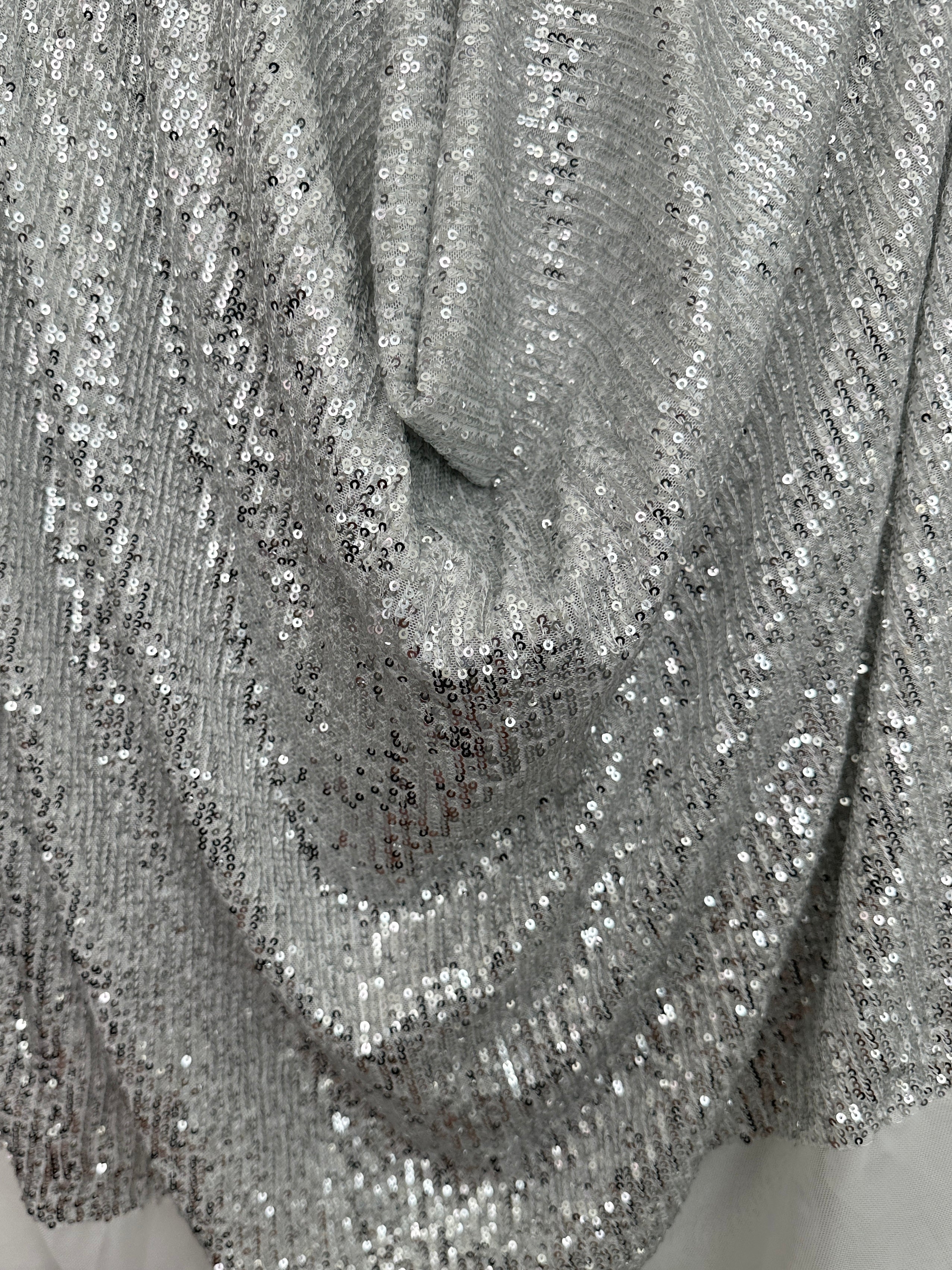 silver super stretch sequin on mesh, light silver sequin on mesh, light silver sequin on mesh, sequin on mesh for woman, sequin on mesh for bride, sequin on mesh on discount, sequin on mesh on sale, premium sequin on mesh, kiki textile sequin on mesh, sequin on mesh for party wear 