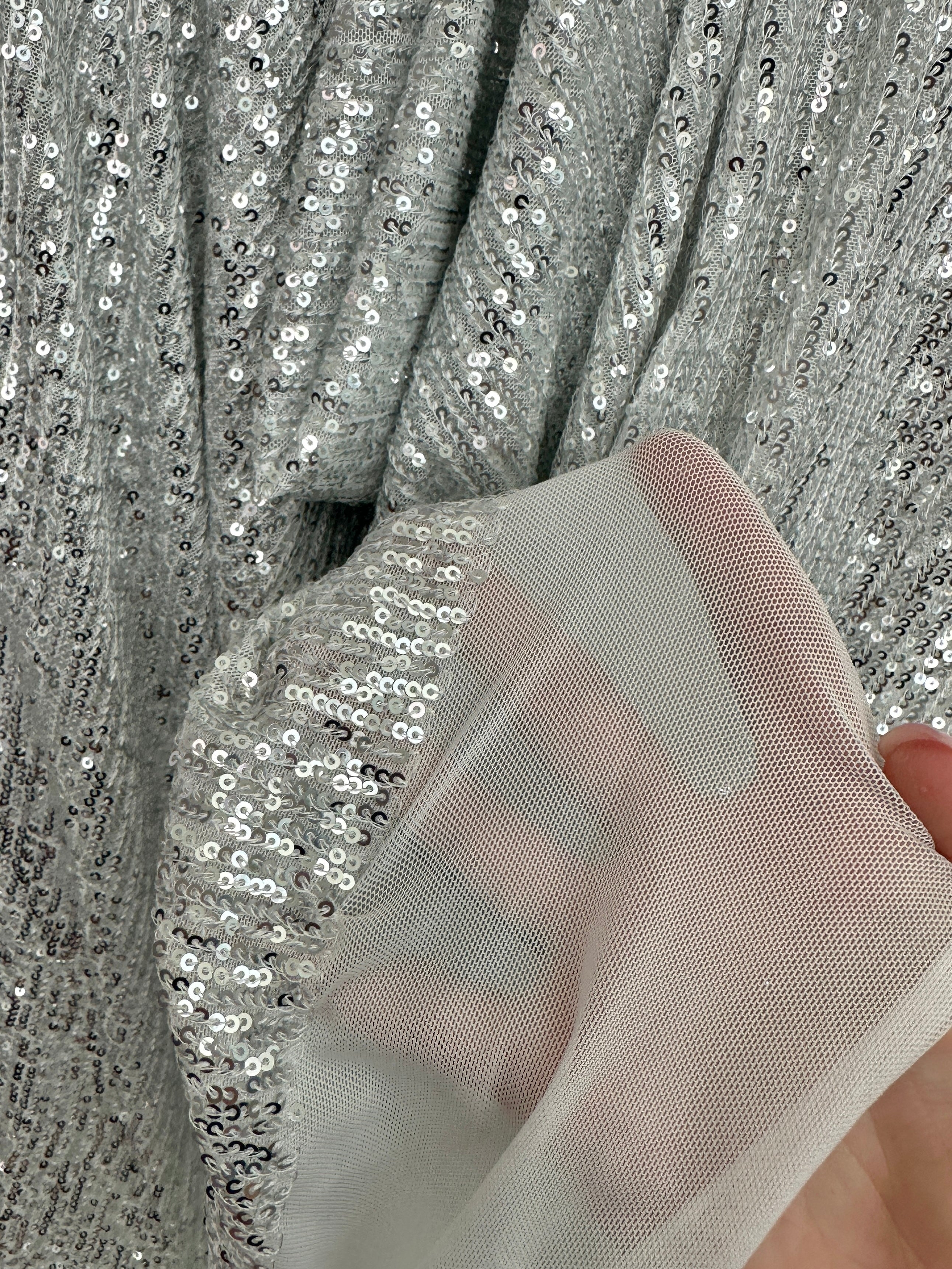 silver super stretch sequin on mesh, light silver sequin on mesh, light silver sequin on mesh, sequin on mesh for woman, sequin on mesh for bride, sequin on mesh on discount, sequin on mesh on sale, premium sequin on mesh, kiki textile sequin on mesh, sequin on mesh for party wear 