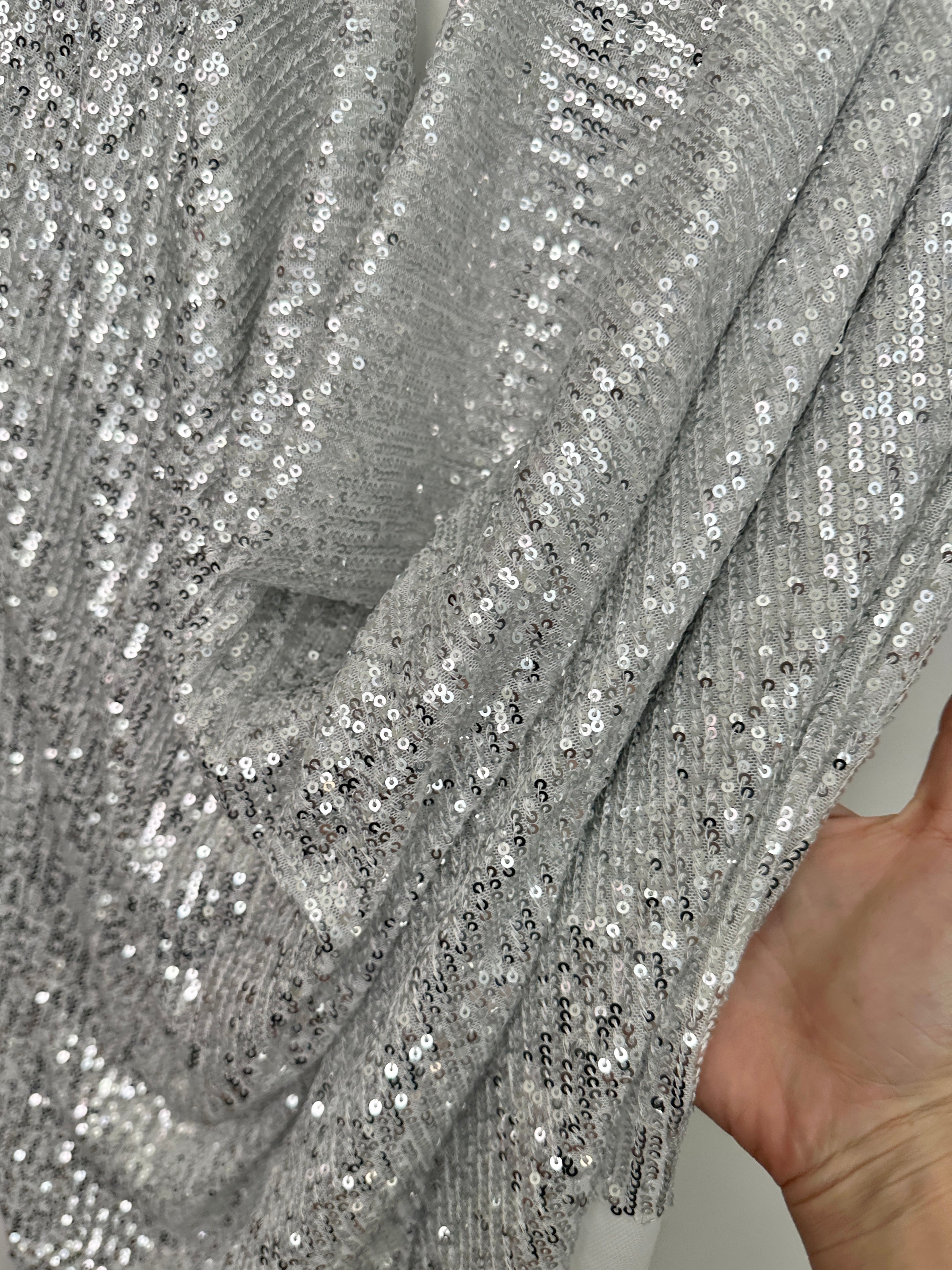 silver super stretch sequin on mesh, light silver sequin on mesh, light silver sequin on mesh, sequin on mesh for woman, sequin on mesh for bride, sequin on mesh on discount, sequin on mesh on sale, premium sequin on mesh, kiki textile sequin on mesh, sequin on mesh for party wear 