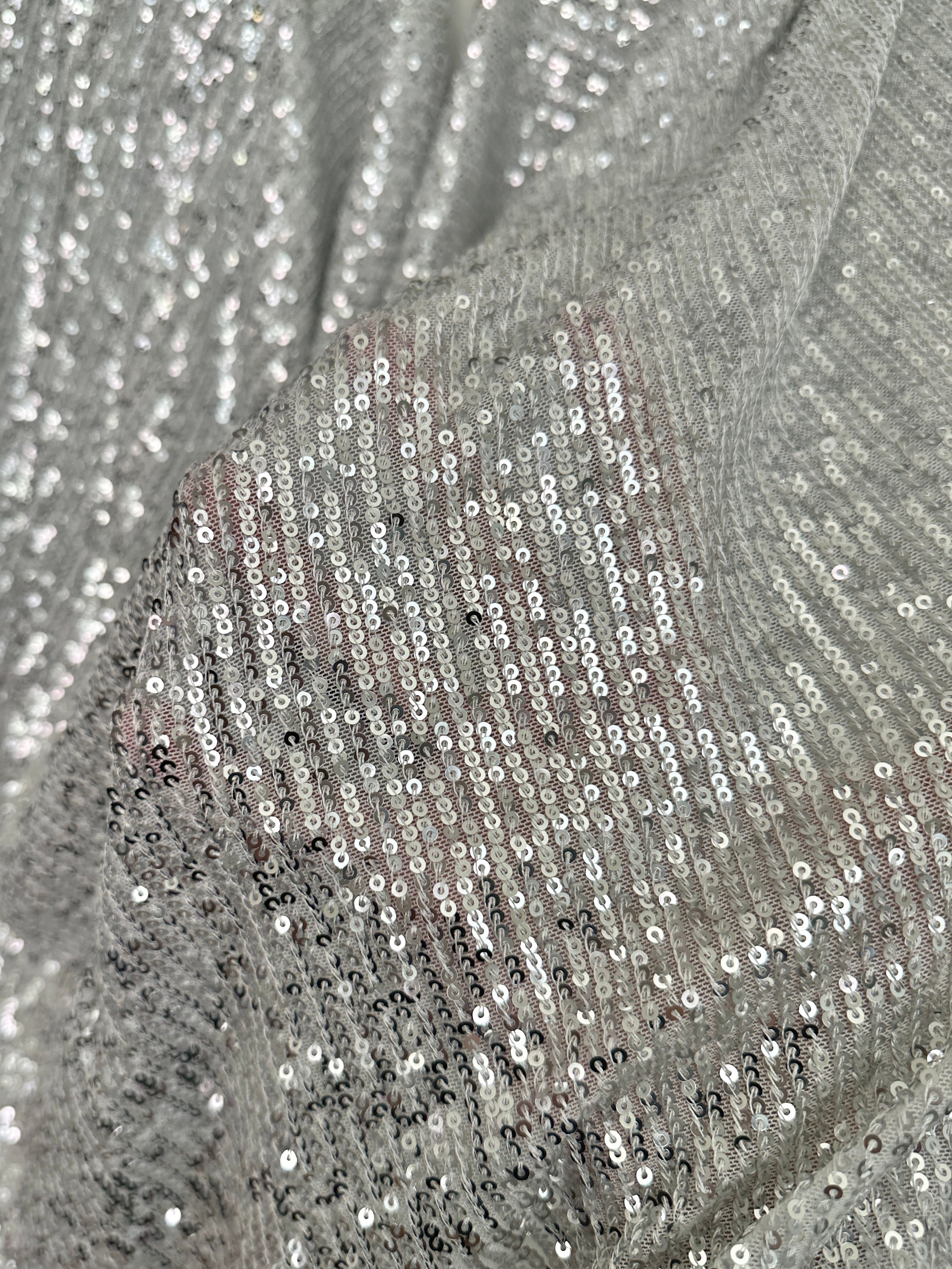 silver super stretch sequin on mesh, light silver sequin on mesh, light silver sequin on mesh, sequin on mesh for woman, sequin on mesh for bride, sequin on mesh on discount, sequin on mesh on sale, premium sequin on mesh, kiki textile sequin on mesh, sequin on mesh for party wear 