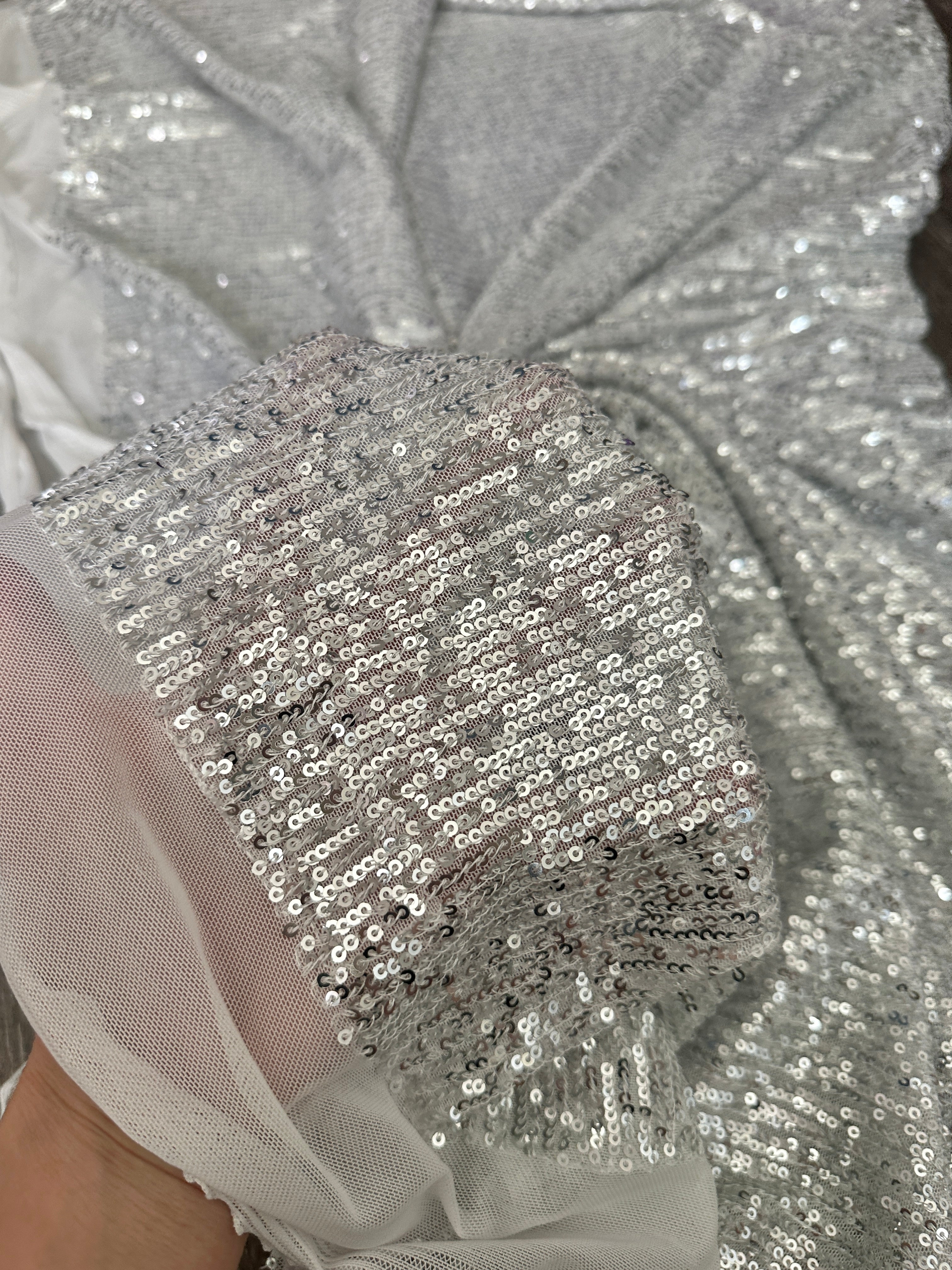 silver super stretch sequin on mesh, light silver sequin on mesh, light silver sequin on mesh, sequin on mesh for woman, sequin on mesh for bride, sequin on mesh on discount, sequin on mesh on sale, premium sequin on mesh, kiki textile sequin on mesh, sequin on mesh for party wear 