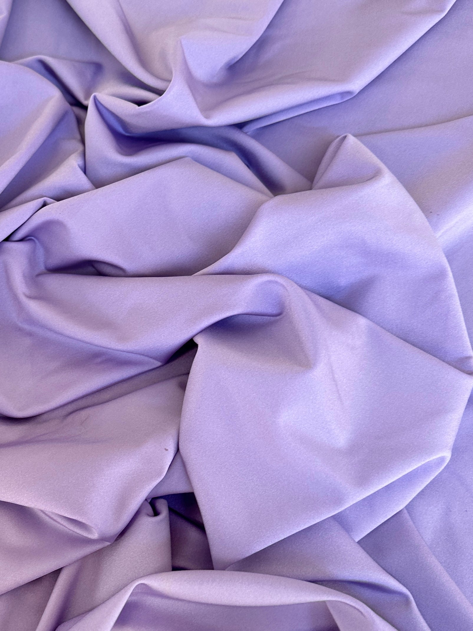 lilac Nylon Spandex, light purple nylon spandex, 4 Way Stretch nylon spandex, Tan Spandex for Dress, shiny nylon spandex for woman, shiny nylon for bride, spandex for swim wear, premium spandex, spandex on sale, low price spandex