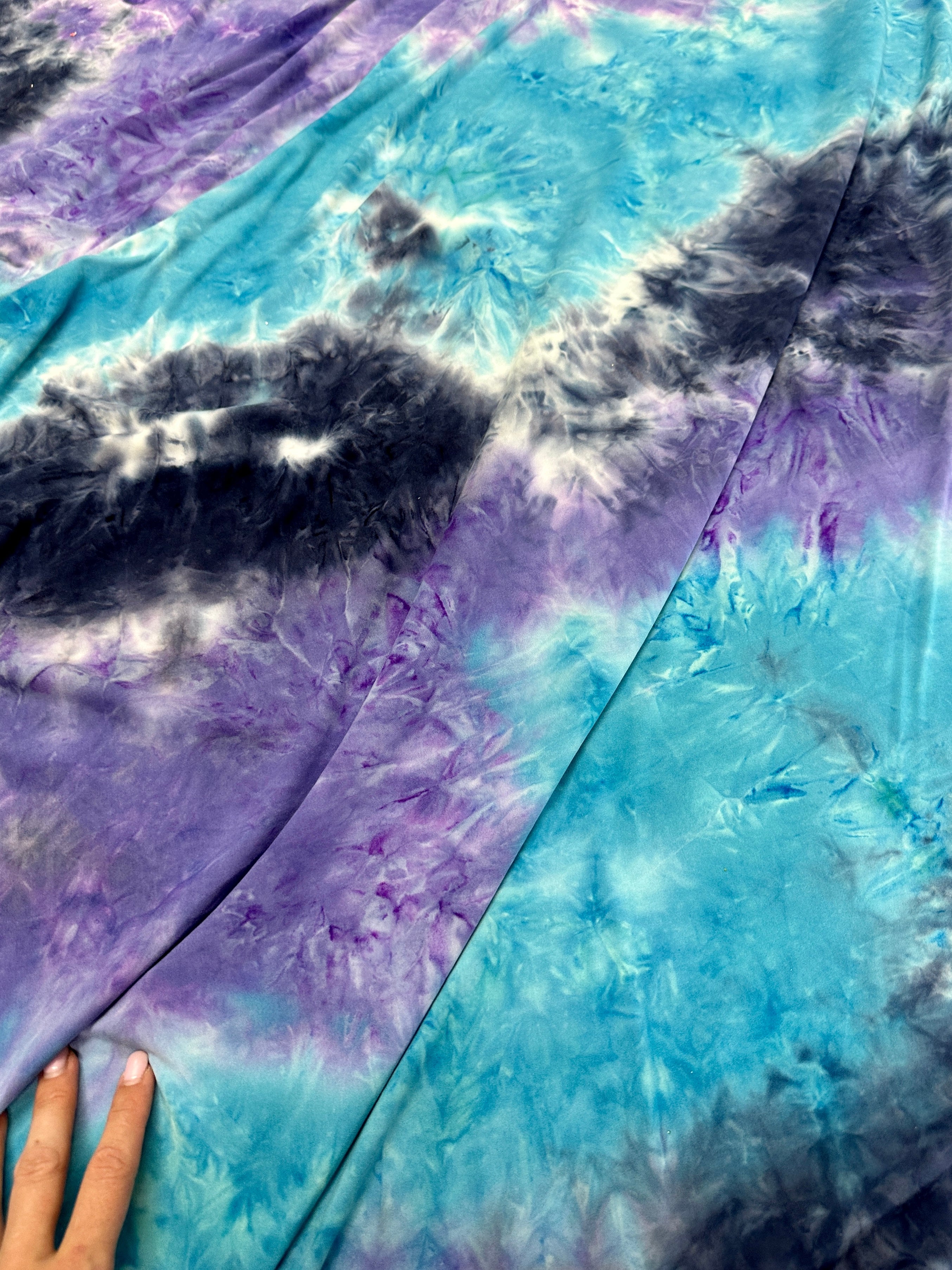 Blue and Purple Tie Dye Jersey Knit, tie dye jersey knit for woman, tie dye jersey knit for party wear, tie dye jersey knit for gown, tie dye jersey knit for bride, tie dye jersey knit on discount, tie dye jersey knit on sale, premium tie dye jersey knit 