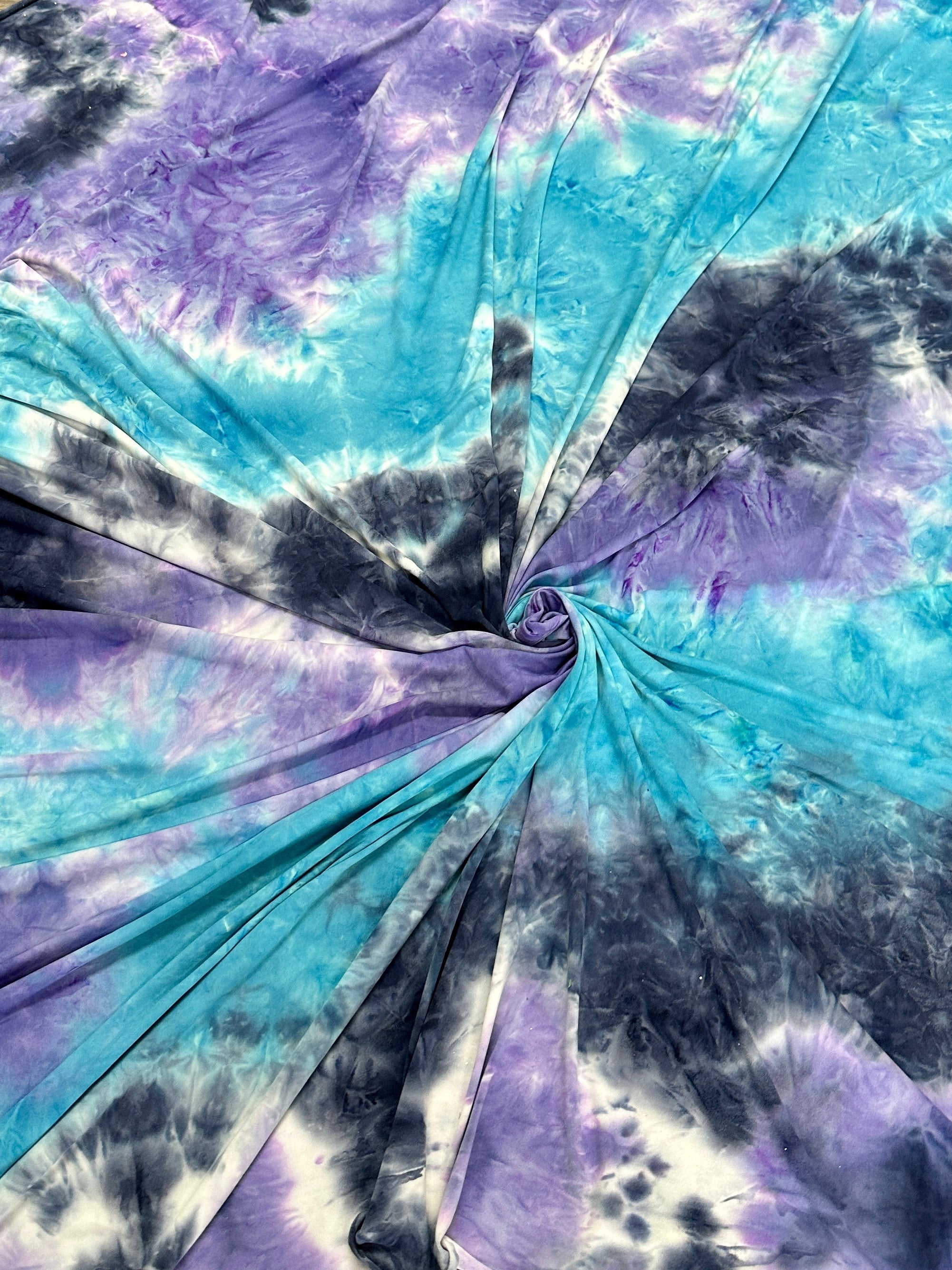 Blue and Purple Tie Dye Jersey Knit, tie dye jersey knit for woman, tie dye jersey knit for party wear, tie dye jersey knit for gown, tie dye jersey knit for bride, tie dye jersey knit on discount, tie dye jersey knit on sale, premium tie dye jersey knit 