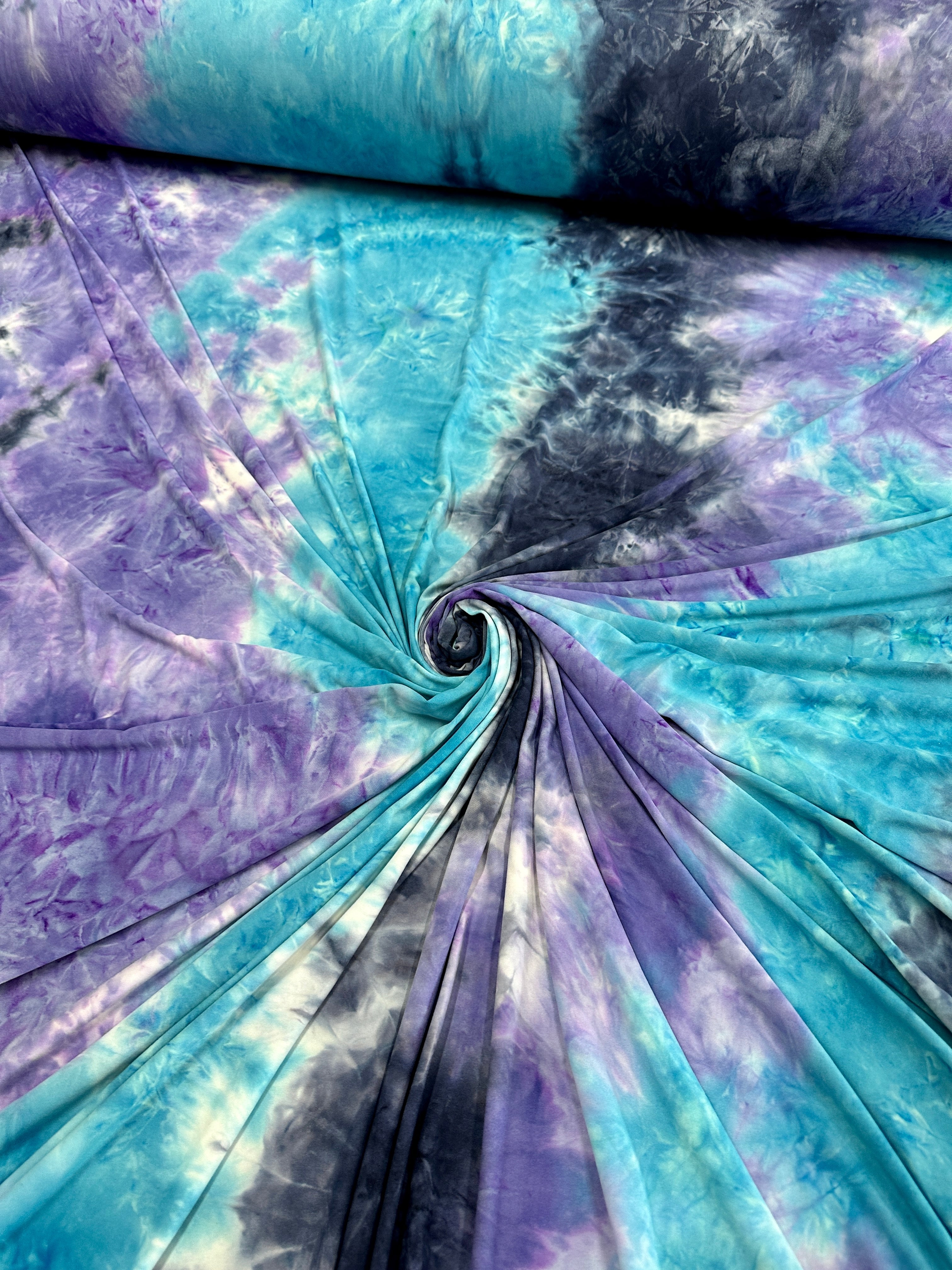 Blue and Purple Tie Dye Jersey Knit, tie dye jersey knit for woman, tie dye jersey knit for party wear, tie dye jersey knit for gown, tie dye jersey knit for bride, tie dye jersey knit on discount, tie dye jersey knit on sale, premium tie dye jersey knit 