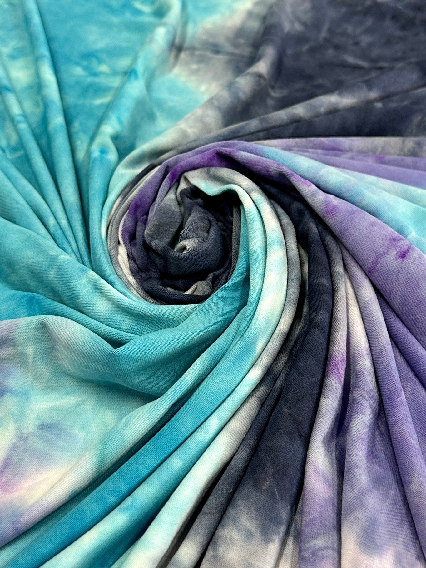 Blue and Purple Tie Dye Jersey Knit, tie dye jersey knit for woman, tie dye jersey knit for party wear, tie dye jersey knit for gown, tie dye jersey knit for bride, tie dye jersey knit on discount, tie dye jersey knit on sale, premium tie dye jersey knit 