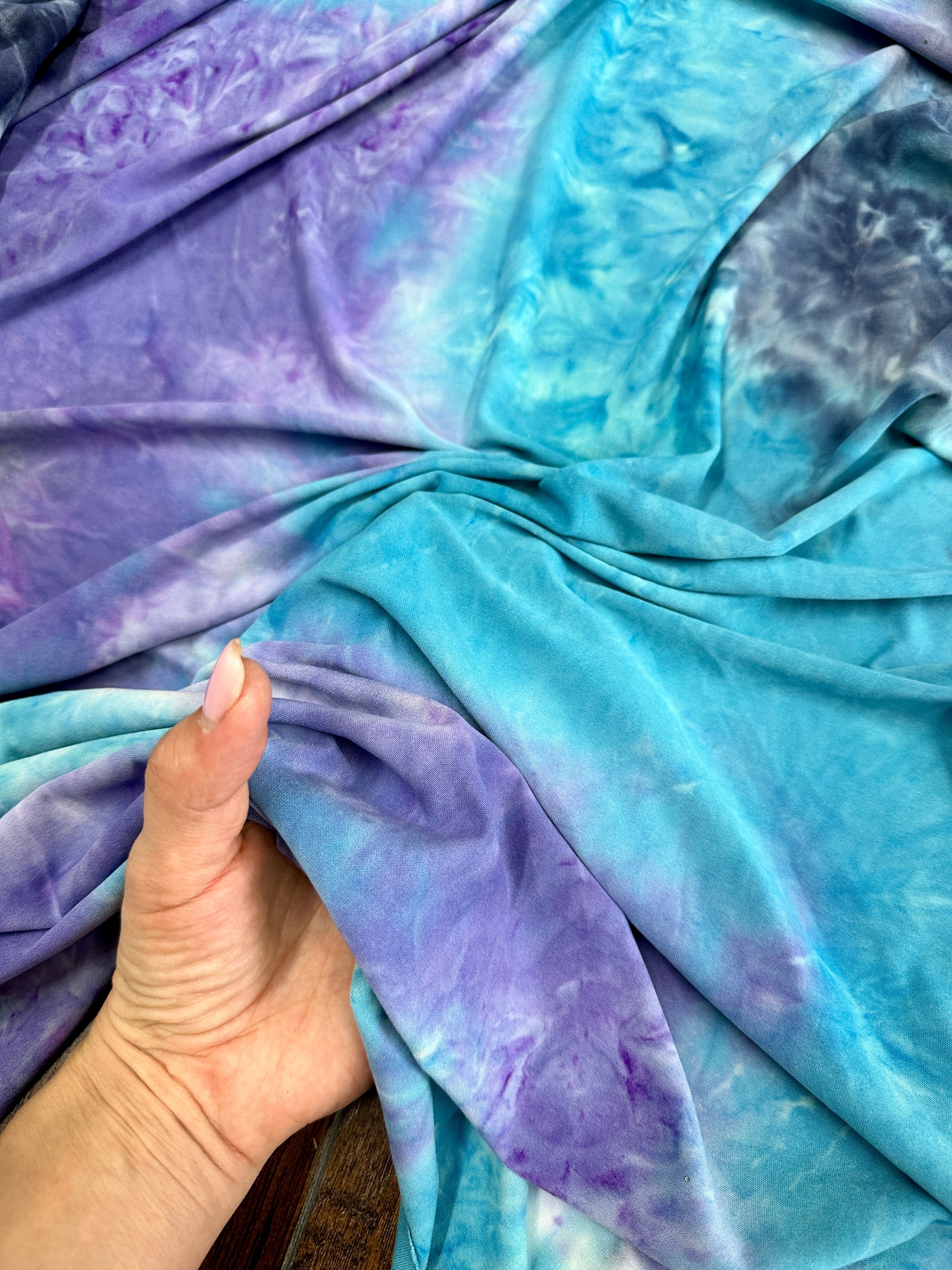Blue and Purple Tie Dye Jersey Knit, tie dye jersey knit for woman, tie dye jersey knit for party wear, tie dye jersey knit for gown, tie dye jersey knit for bride, tie dye jersey knit on discount, tie dye jersey knit on sale, premium tie dye jersey knit 