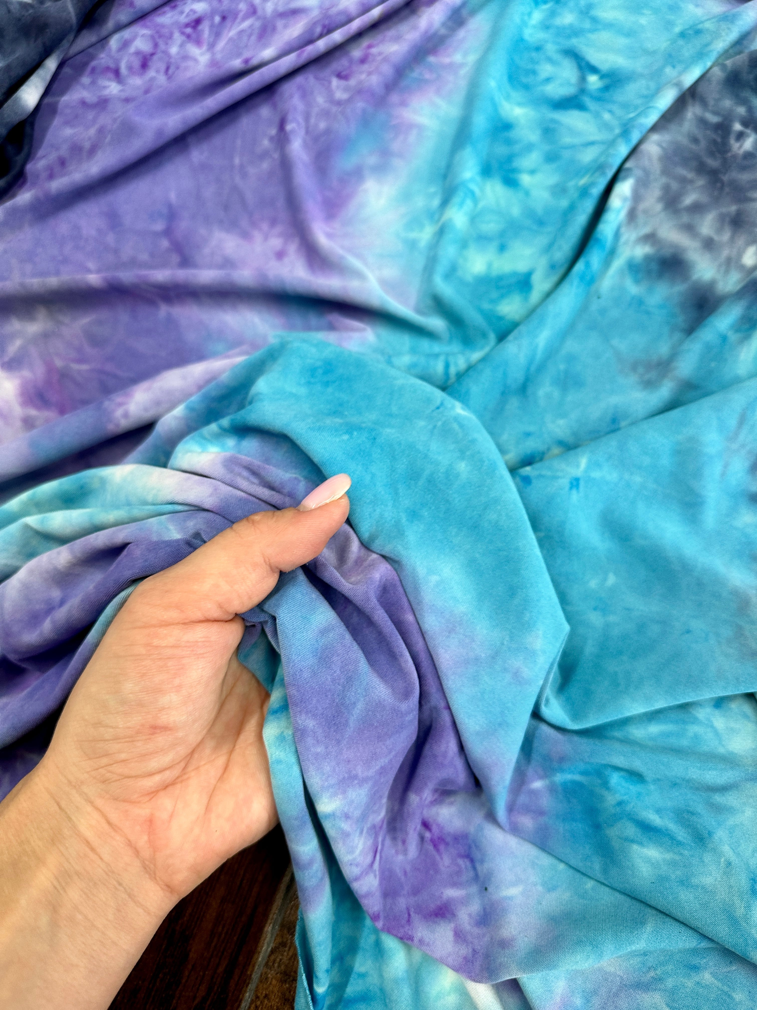 Blue and Purple Tie Dye Jersey Knit, tie dye jersey knit for woman, tie dye jersey knit for party wear, tie dye jersey knit for gown, tie dye jersey knit for bride, tie dye jersey knit on discount, tie dye jersey knit on sale, premium tie dye jersey knit 