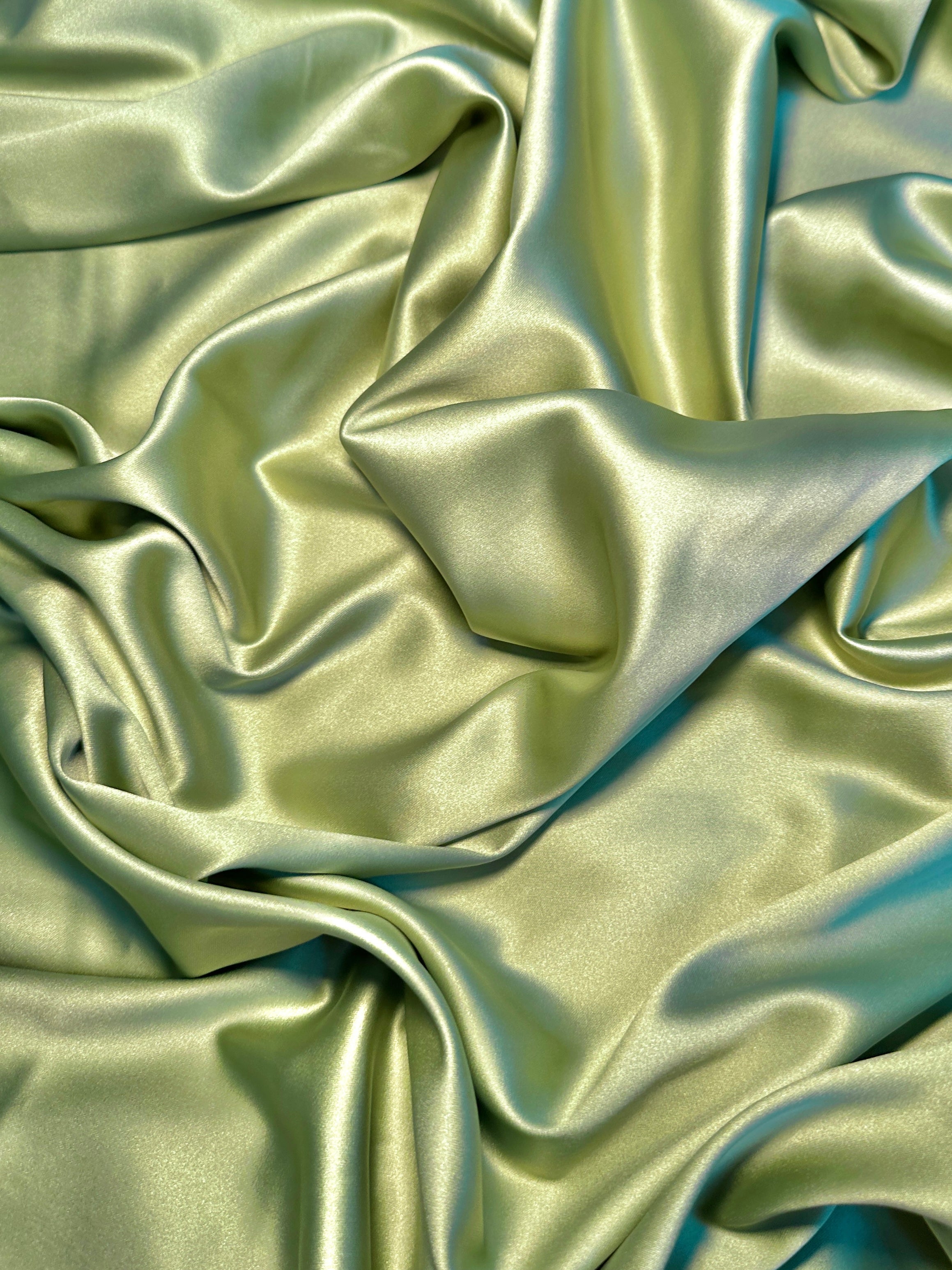 pistachio stretch crepe back satin, light green stretch crepe back satin, green stretch crepe back satin, premium stretch crepe back satin, satin for bride, satin for woman, satin in low price, cheap satin, satin on sale