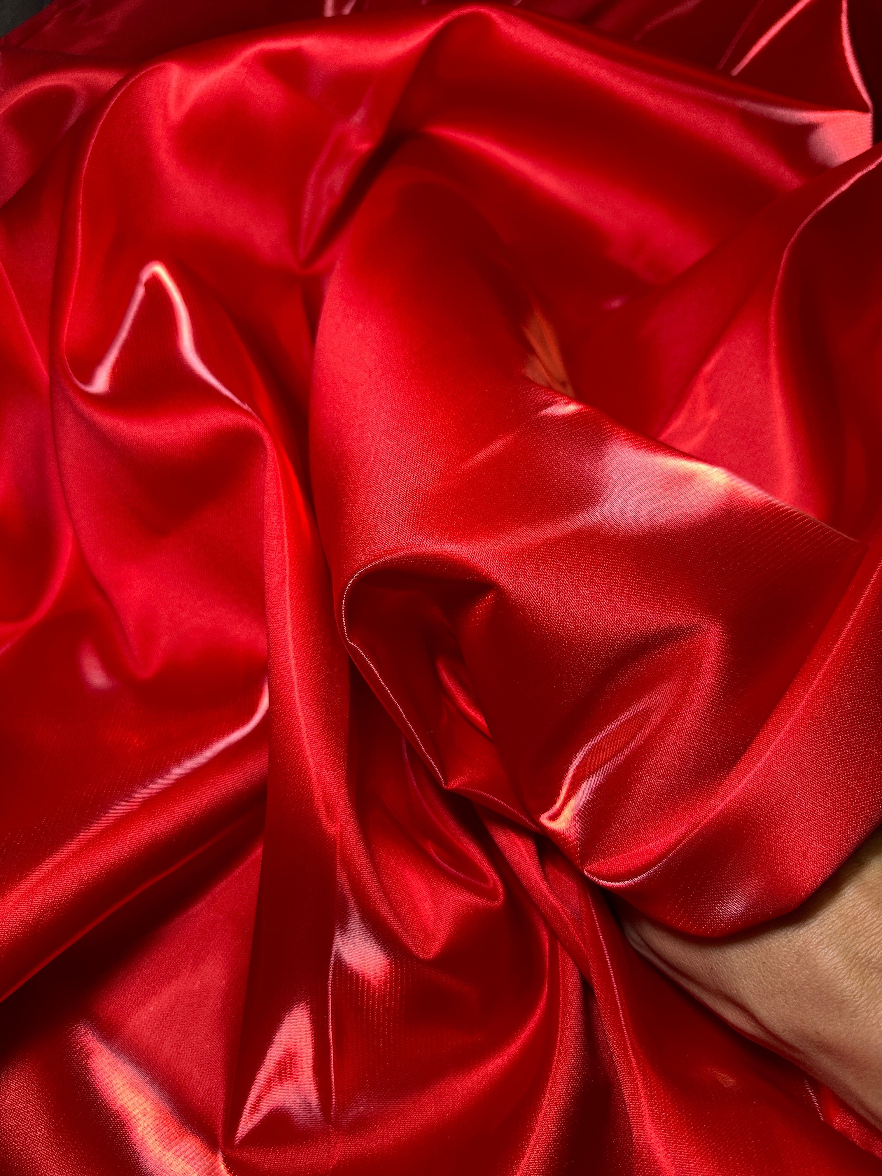 red bridal liquid satin close up image to represent texture and  FABRIC FEEL 