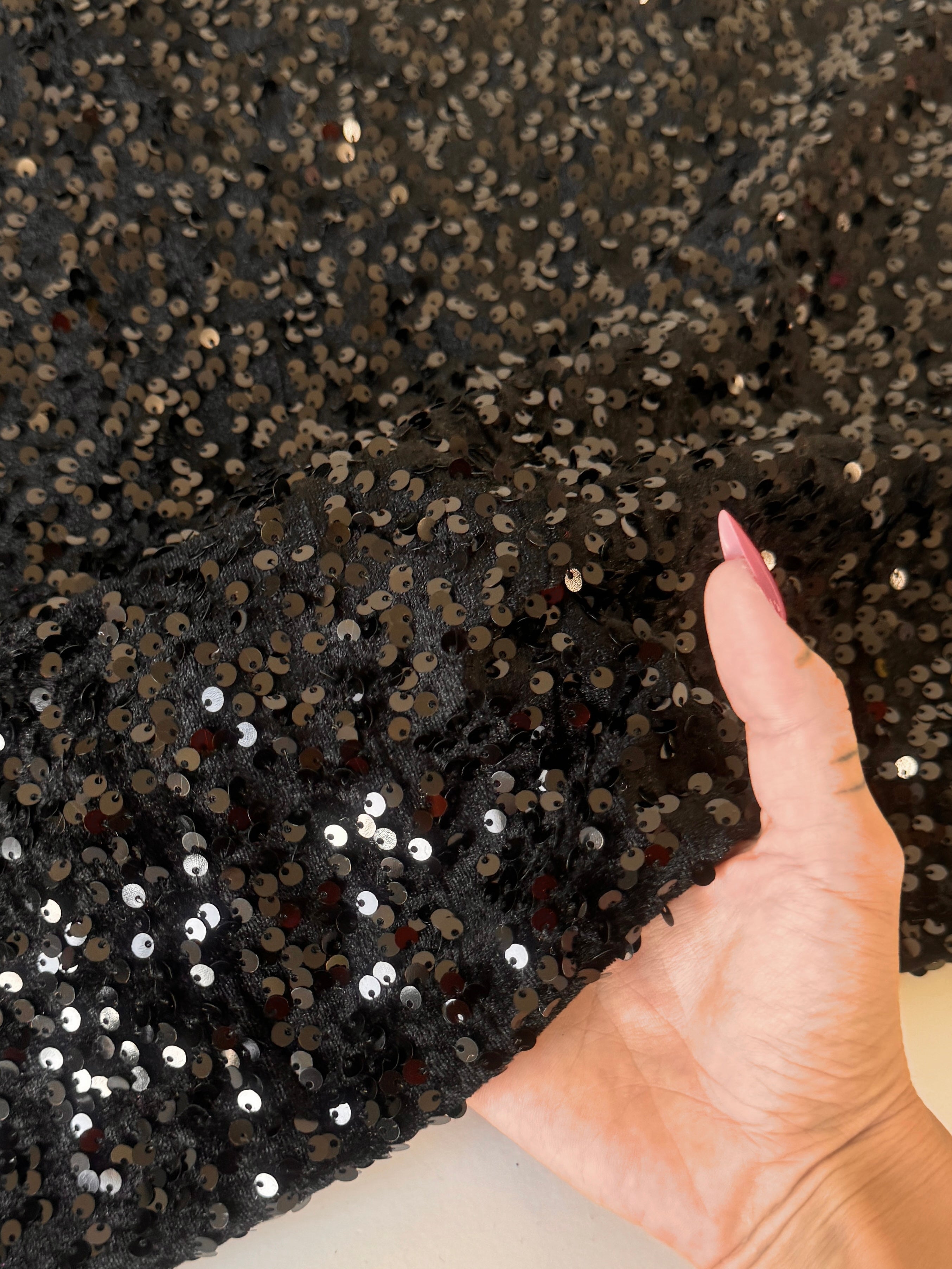 luxurious black velvet material and stretch velvet fabric for dresses, costumes, apparel, décor, and more.