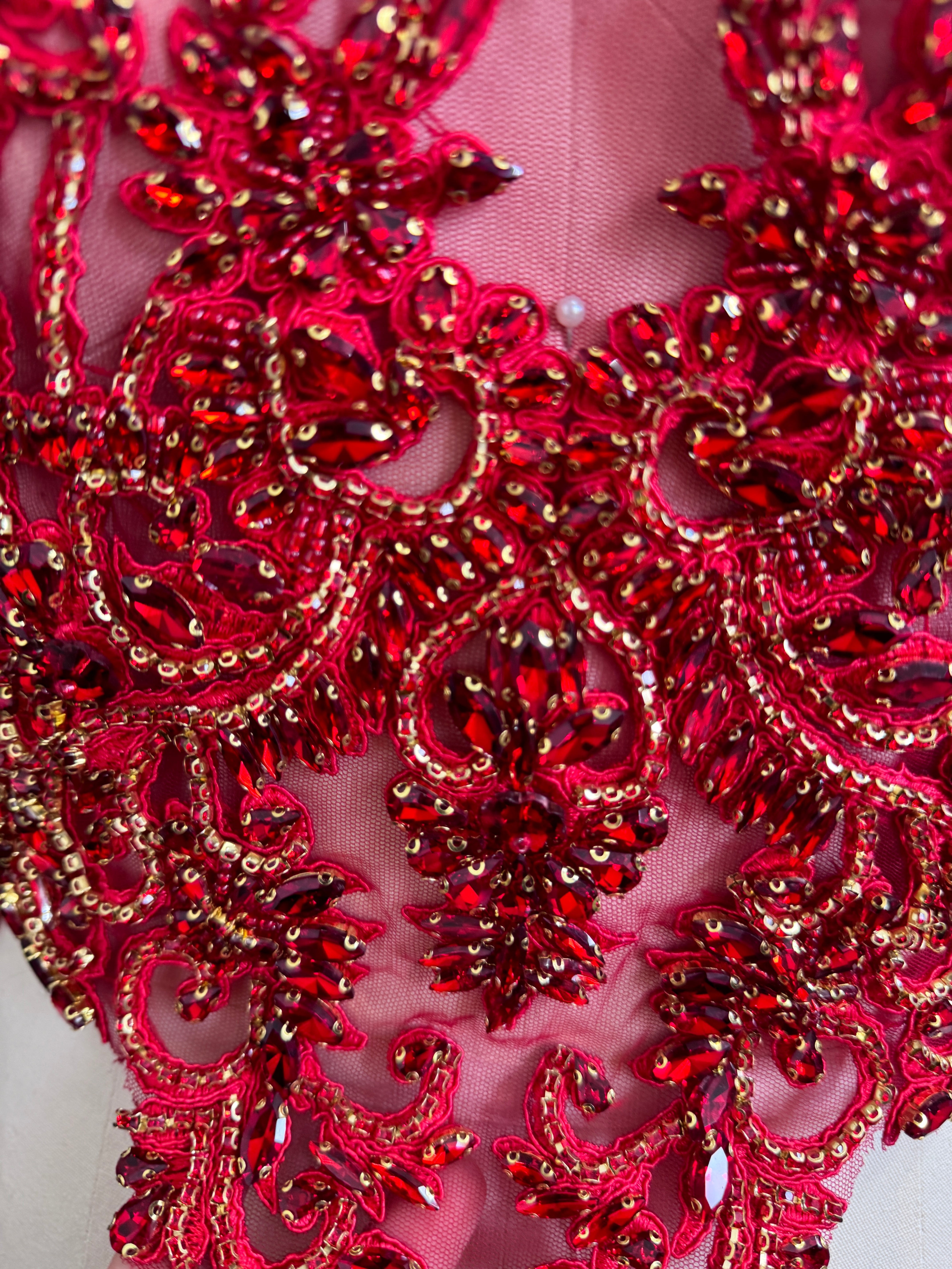 closer look of bead Embellishment on a sheer fabric  