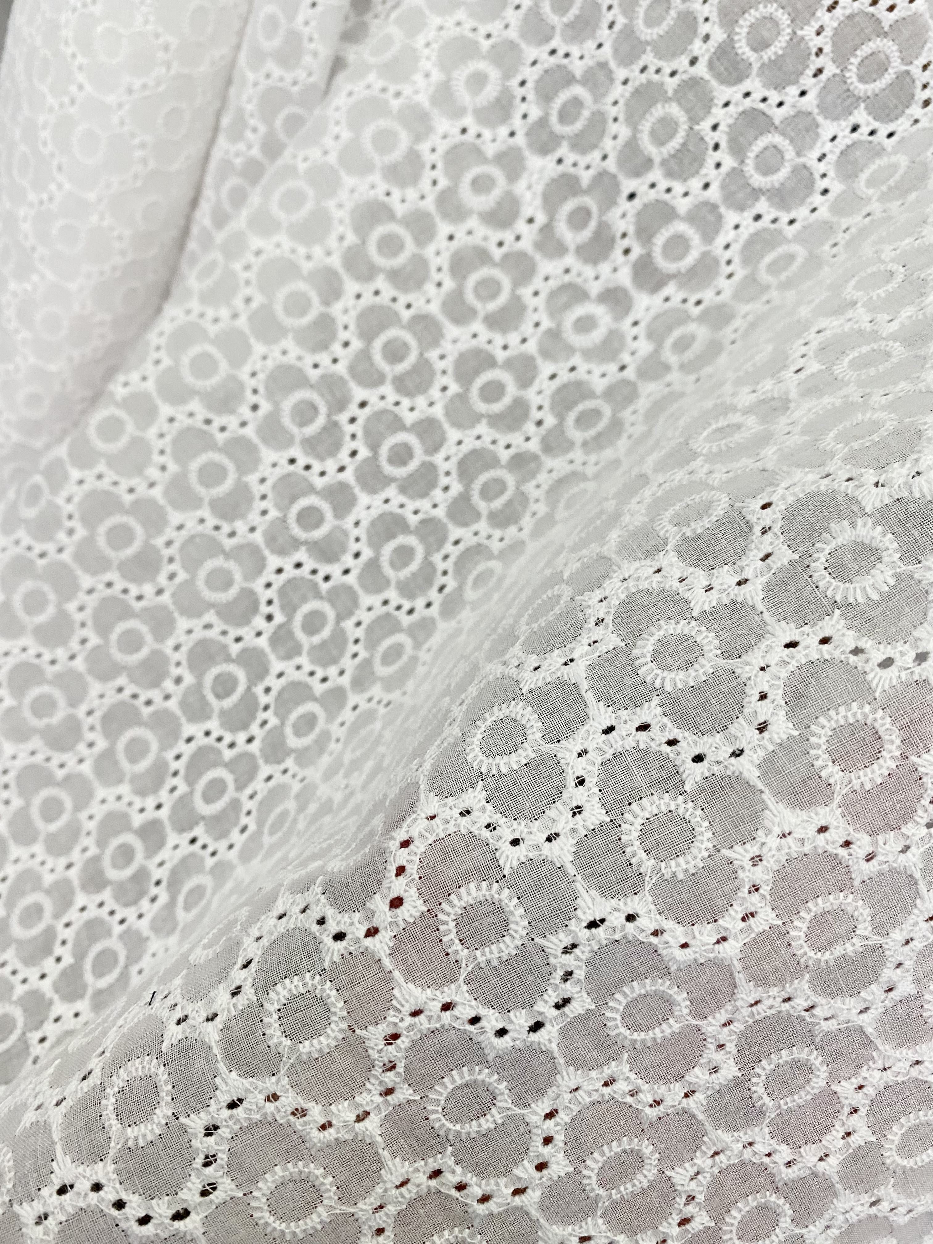 White floral Cotton Eyelet, cotton eyelets for woman, off white cotton eyelets, milky white cotton eyelets, cotton eyelet in low price, premium cotton eyelets, kiki textile cotton eyelets