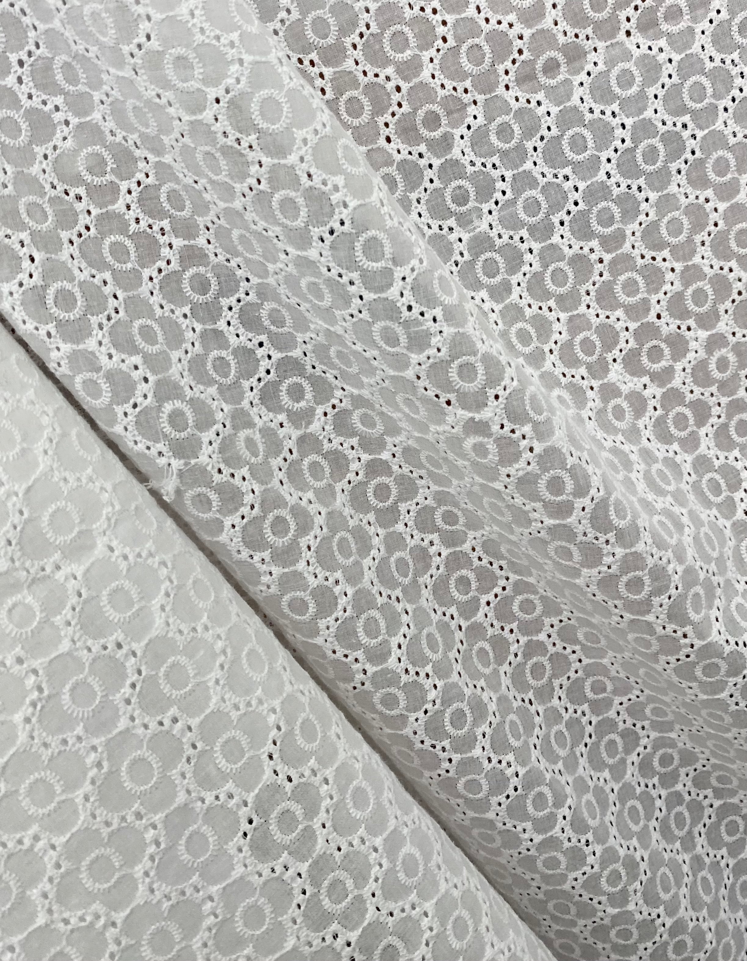 White floral Cotton Eyelet, cotton eyelets for woman, off white cotton eyelets, milky white cotton eyelets, cotton eyelet in low price, premium cotton eyelets, kiki textile cotton eyelets