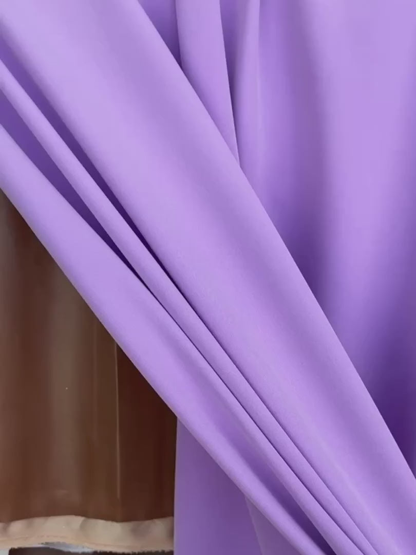 lavender stretch crepe, lavender color fabric, purple color fabric, purple dress for woman, light purple dress, best lavender color, fabric for woman, purple bridal dress, stretch bridal dress, cheap fabric, discounted fabric, buy fabric for woman online, luxury dress for woman, viscose crepe, crepe clothing material, wedding crepe, opac fabric, stretch crepe back satin