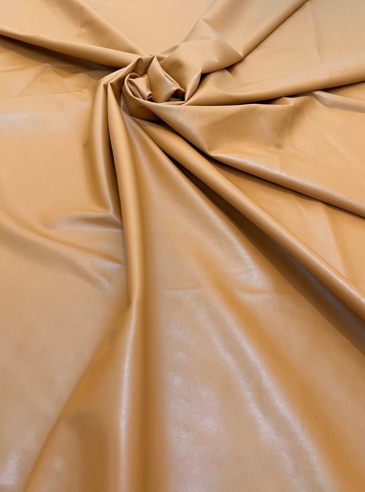 Caramel Pleather, dark brown Pleather, light brown Pleather, premium Pleather, Pleather for sofa, Pleather for jackets, Pleather in low price, Pleather on discount, Pleather on sale, Pleather for apparels, Pleather for furniture