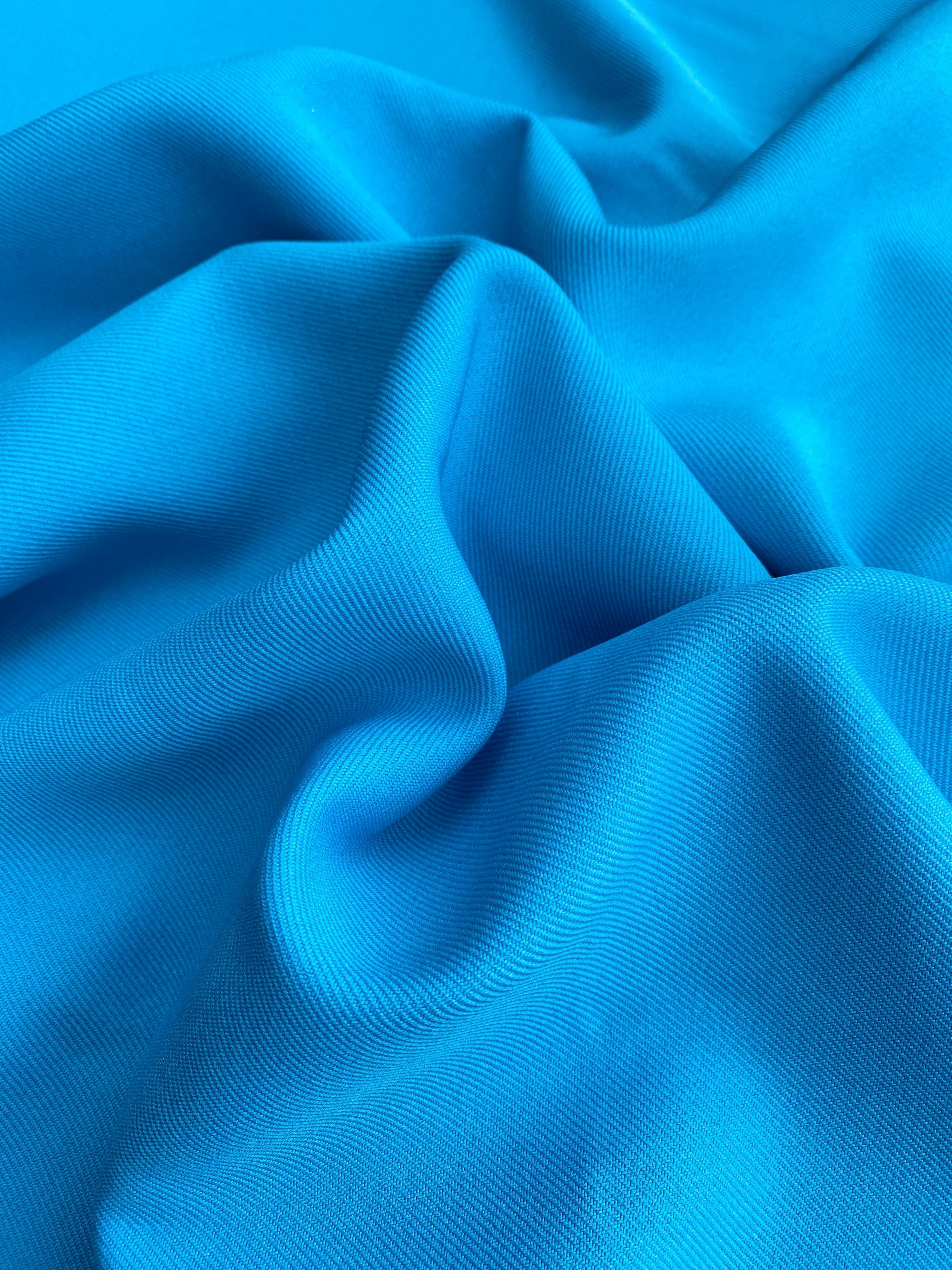turquoise delaney gabardine, turquoise gabardine fabric, blue gabardine fabric, blue crepe and gabardine, royal bue gabardine fabric for pants, teal blue gabardine fabric for suit, blue gabardine and crepe, turquoise gabardine fabric for gown