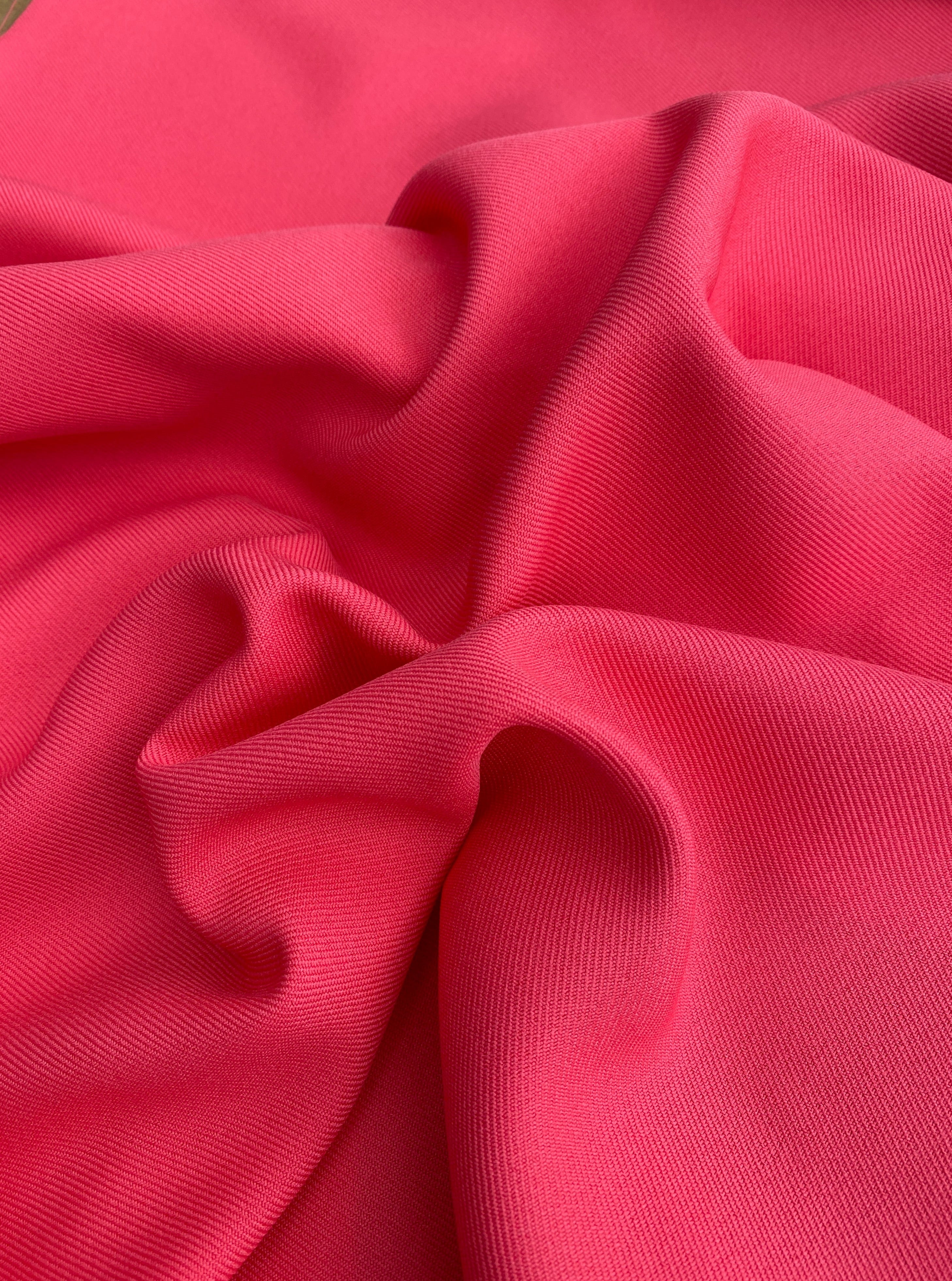 coral delaney gabardine, hot pink gabardine, pink gabardine, fuchsia gabardine, bright pink gabardine, gabardine material, kiki textiles, gabardine store in usa, twill gabardine, wrinkle free fabric, soft gabardine, solid color fabric, gabardine for suit, bridal fabric, gabardine material by yard, gabardine fabric