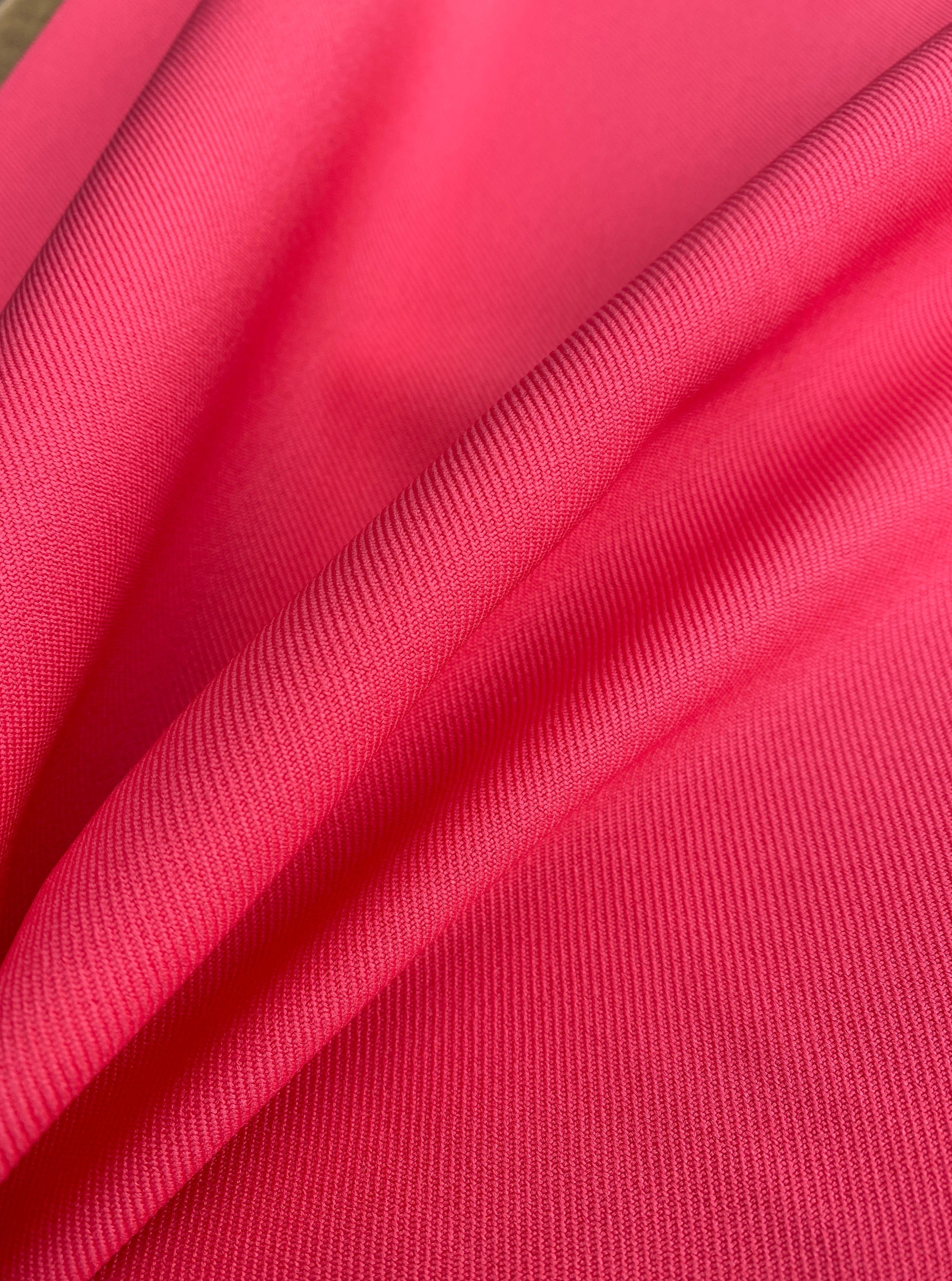 coral delaney gabardine, hot pink gabardine, pink gabardine, fuchsia gabardine, bright pink gabardine, gabardine material, kiki textiles, gabardine store in usa, twill gabardine, wrinkle free fabric, soft gabardine, solid color fabric, gabardine for suit, bridal fabric, gabardine material by yard, gabardine fabric