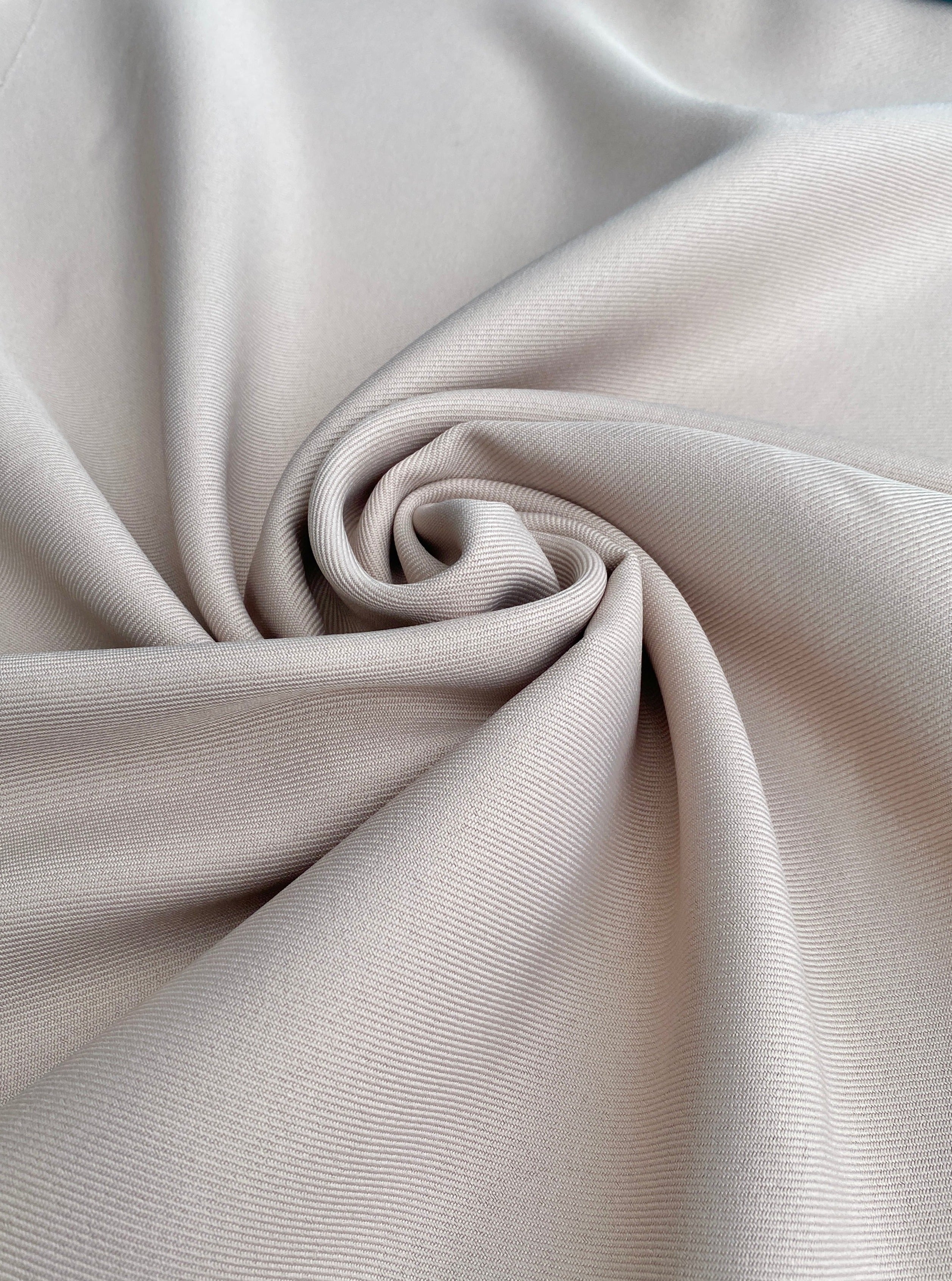 beige delaney gabardine, off white delaney gabardine, light gray gabardine, light brown gabardine, pink white gabardine, gabardine material, twill gabardine, wrinkle free fabric, gabardine store in usa, gabardine fabric by yard, soft gabardine, solid fabric, bridal fabric, gabardine for suit