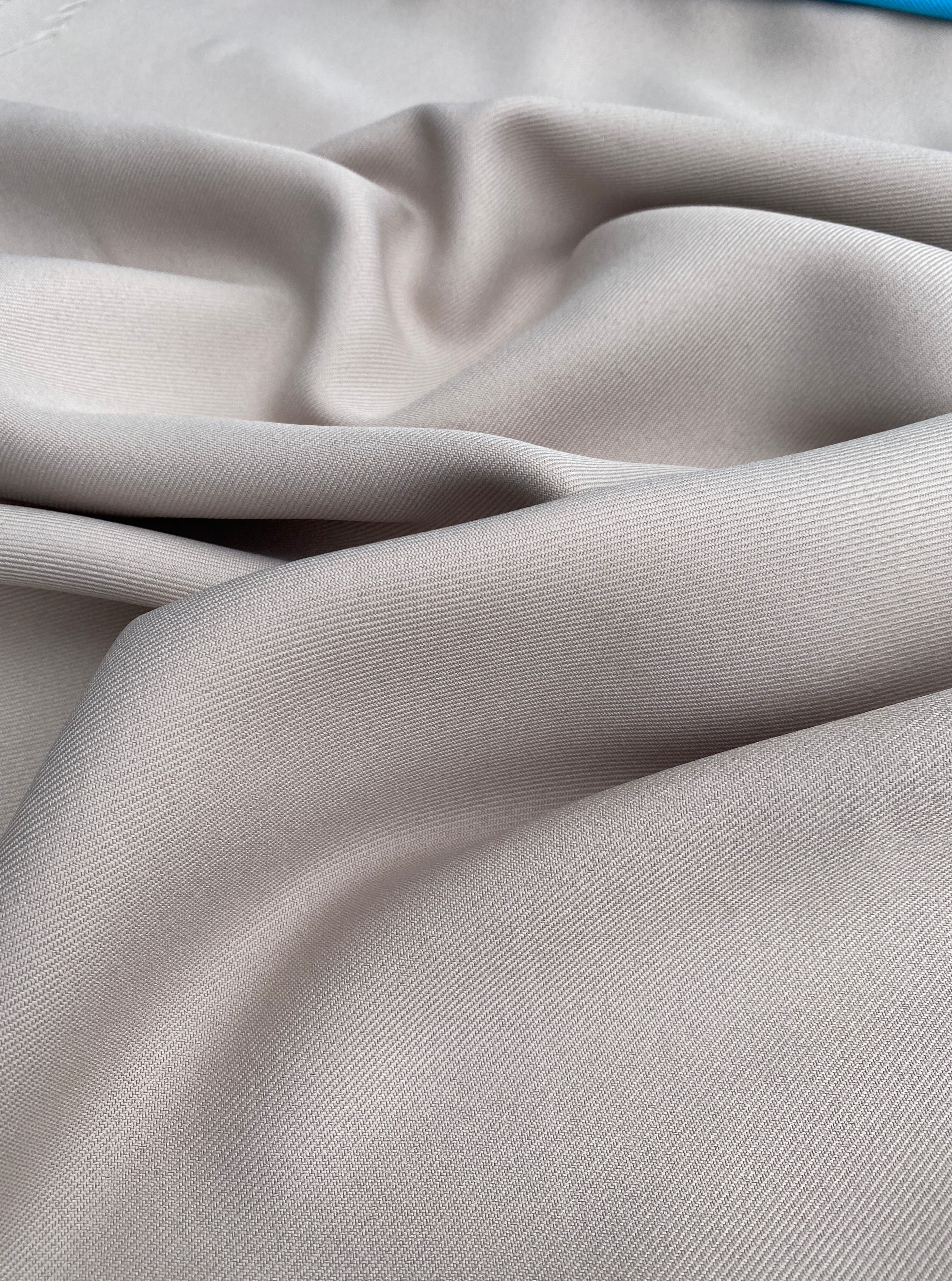 beige delaney gabardine, off white delaney gabardine, light gray gabardine, light brown gabardine, pink white gabardine, gabardine material, twill gabardine, wrinkle free fabric, gabardine store in usa, gabardine fabric by yard, soft gabardine, solid fabric, bridal fabric, gabardine for suit