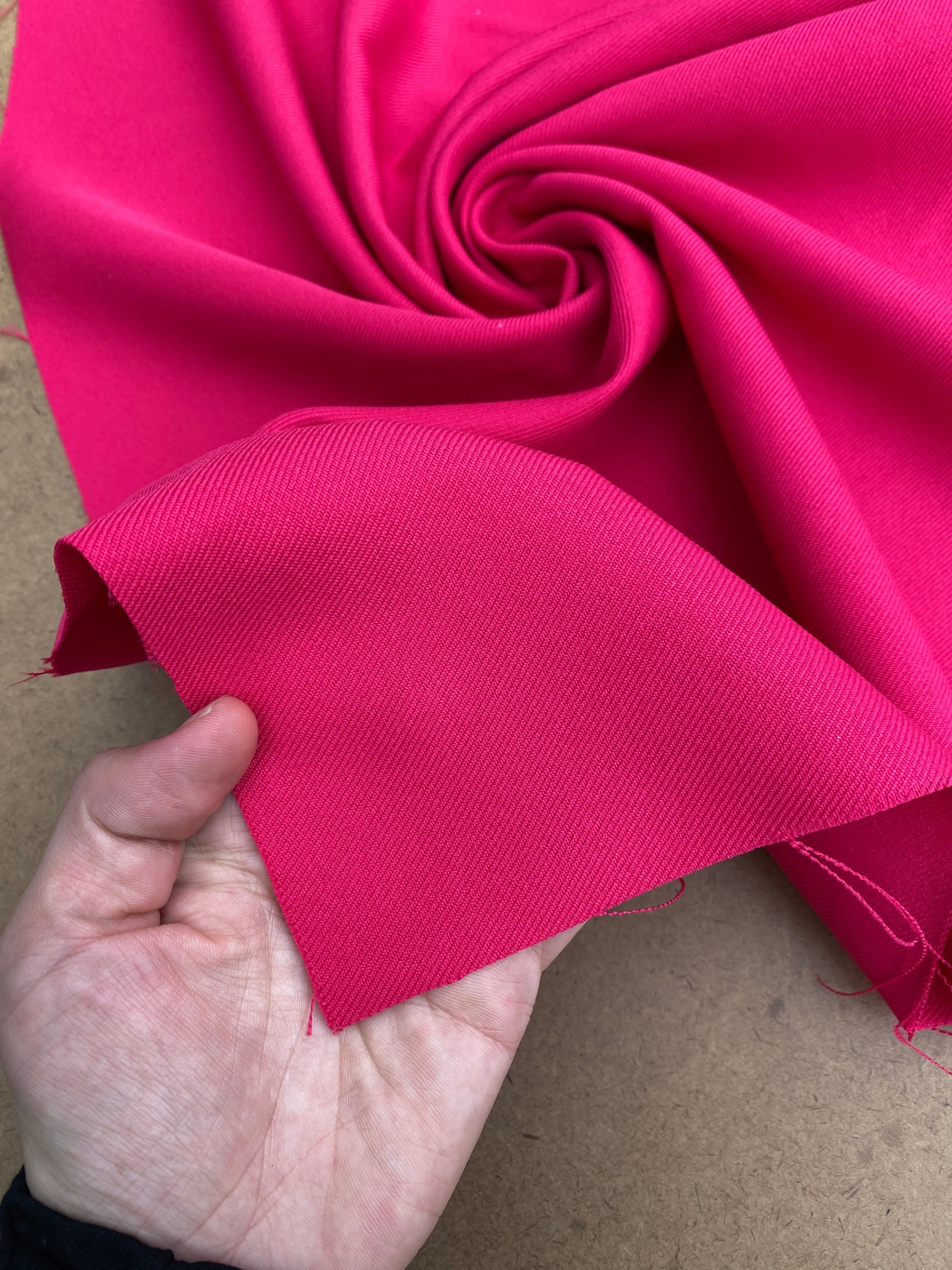 fuchsia gabardine, pink gabardine fabric for pants, fuchsia gabardine fabric for suits, crepe and gabardine,crepe and gabardiine store, gabardine fabric for brides, hot pink fabric gabardine, hot pink gabardine soft fabric, delaney gabardine, fuchsia delaney gabardine, gabardine material, gabardine store in los angeles