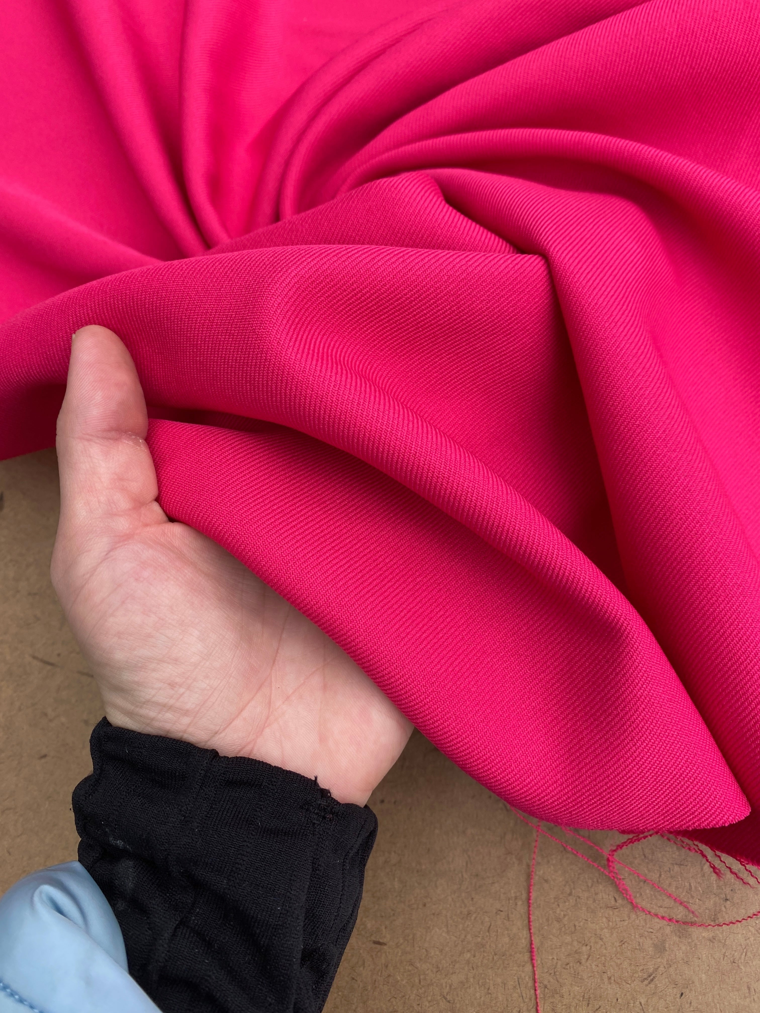 fuchsia gabardine, pink gabardine fabric for pants, fuchsia gabardine fabric for suits, crepe and gabardine,crepe and gabardiine store, gabardine fabric for brides, hot pink fabric gabardine, hot pink gabardine soft fabric, delaney gabardine, fuchsia delaney gabardine, gabardine material, gabardine store in los angeles