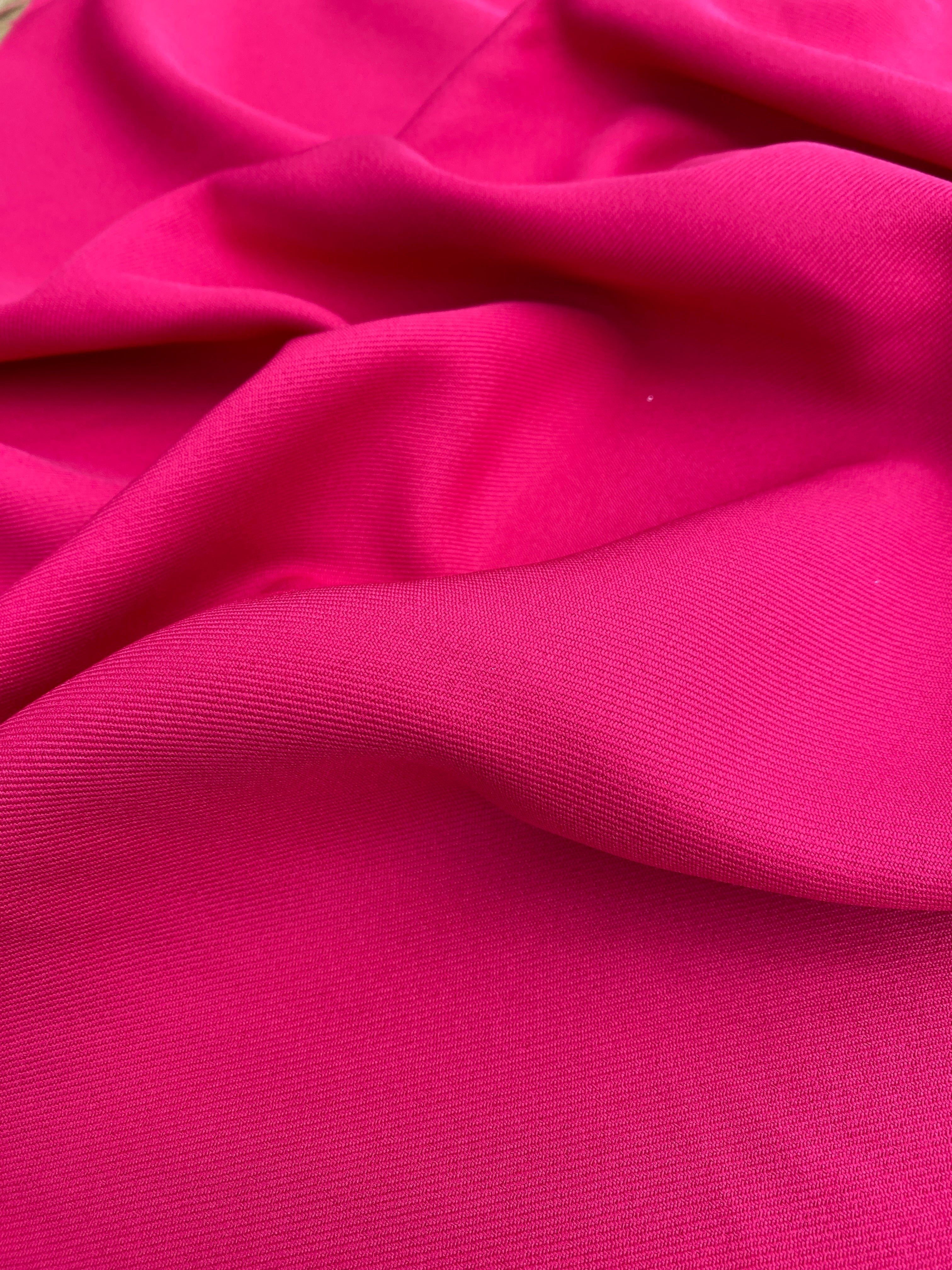 fuchsia gabardine, pink gabardine fabric for pants, fuchsia gabardine fabric for suits, crepe and gabardine,crepe and gabardiine store, gabardine fabric for brides, hot pink fabric gabardine, hot pink gabardine soft fabric, delaney gabardine, fuchsia delaney gabardine, gabardine material, gabardine store in los angeles