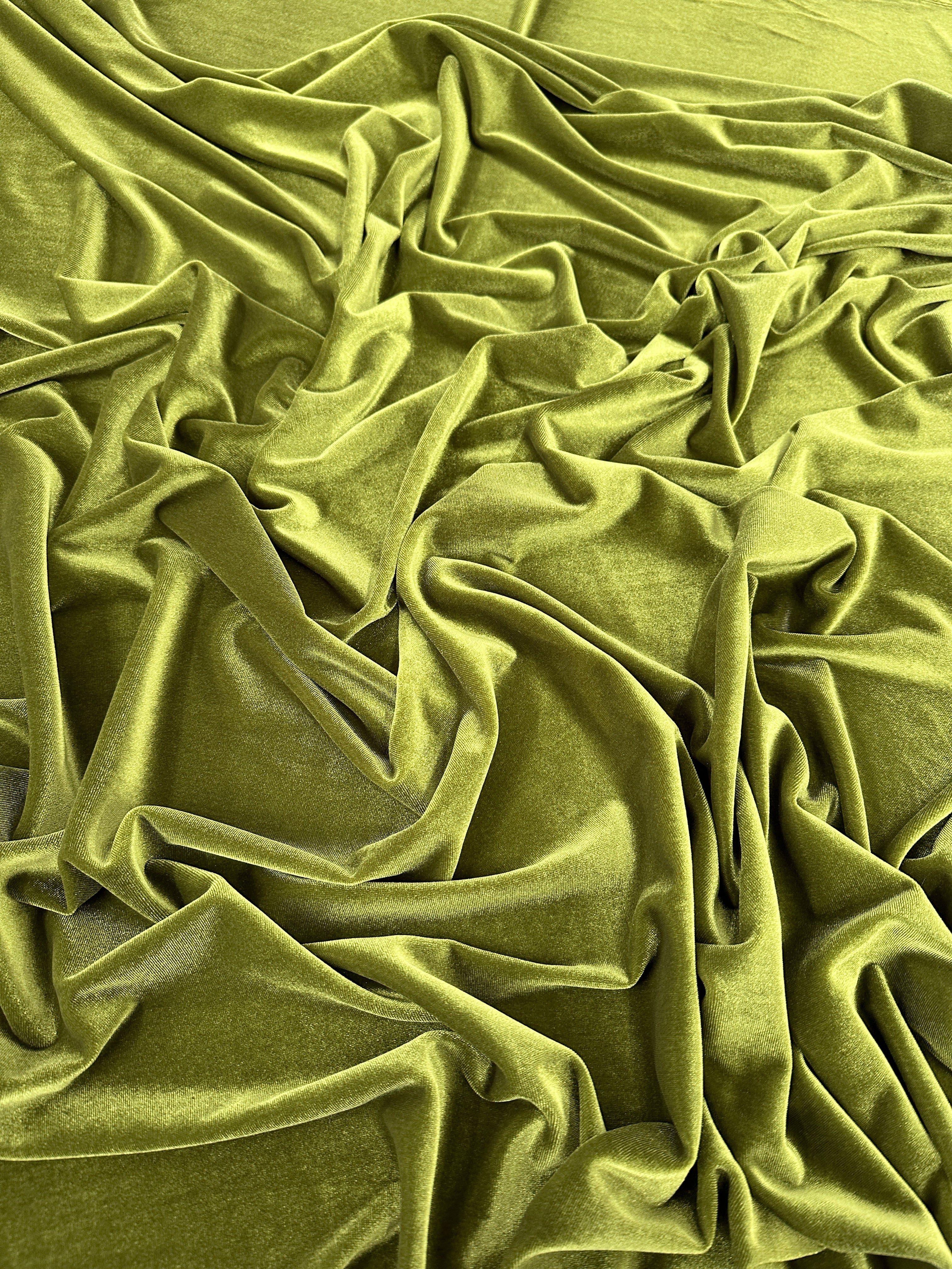 Olive stretch velvet, olive stretch velvet for gown, olive velvet for wedding, olive stretch pure velvet, mint stretch velvet for brides, green stretch fancy velvet, green color velvet for dress, olive green color stretch expensive velvet