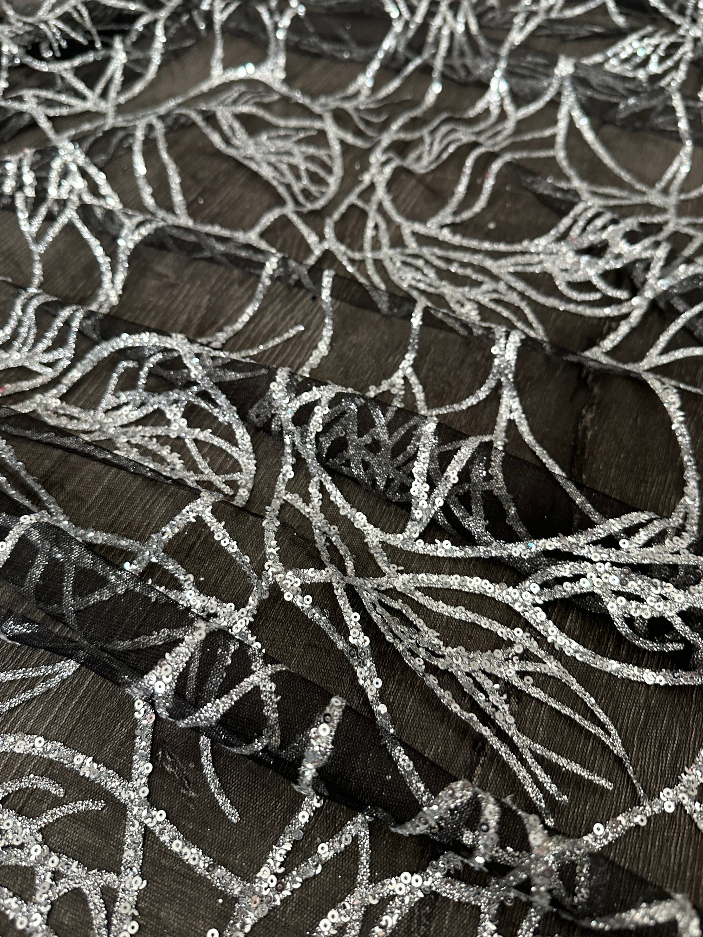 Silver Sequin Glitter Webbed Design Lace Fabric, Geometric Silver Stretch Lace on Black Mesh, Shimmer Silver lace for gown, Bridal Lace, lace fabric on discount, lace fabric on sale, premium lace fabric, buy lace fabric online, lace fabric for woman, lace fabric for bride