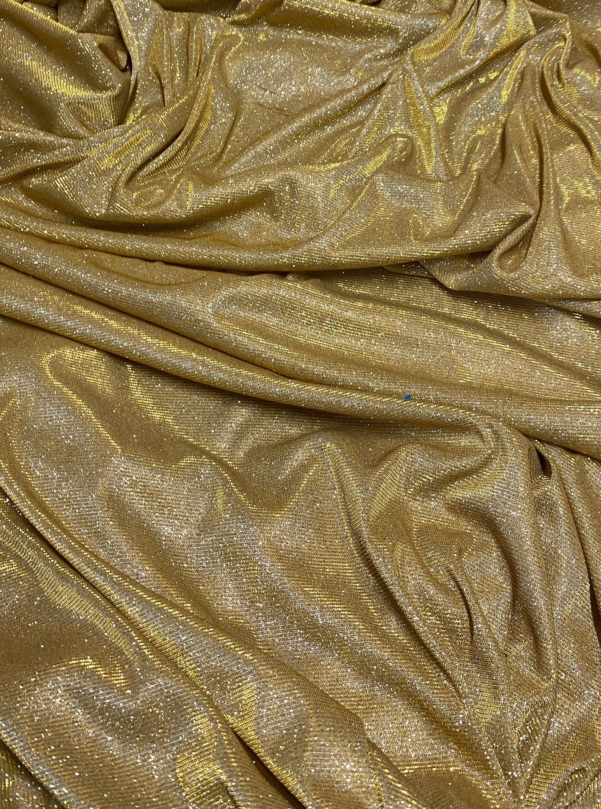 gold stretch metallic lurex, gold stretch metallic lurex for woman, dusty gold stretch metallic lurex, party wear gold stretch metallic lurex, shiny lurex, stretch metallic lurex for bride, lurex on discount, lurex on sale, buy metallic lurex online, lurex for gown