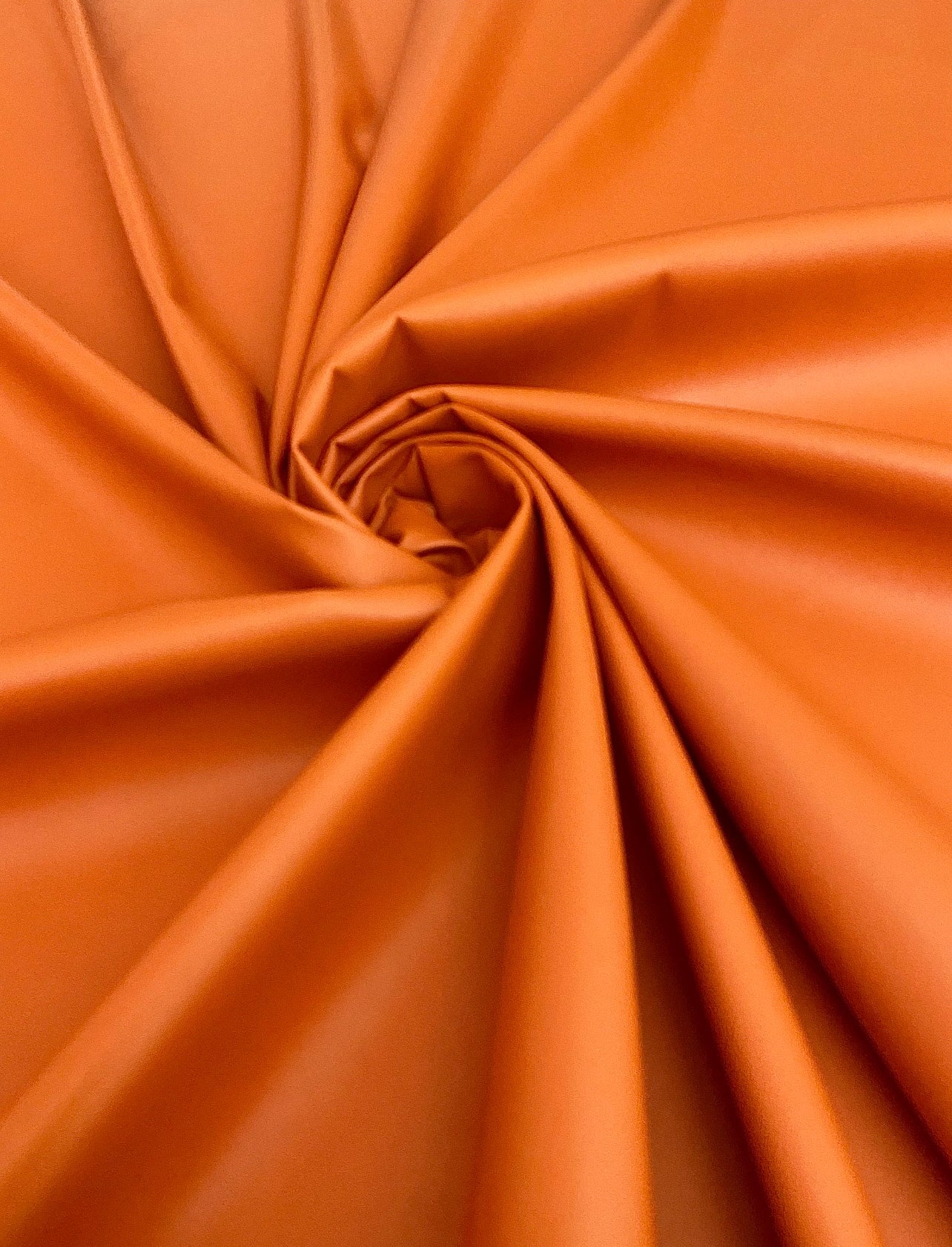 orange stretch Faux Leather, light orange Faux Leather, Faux Leather for jackets, Faux Leather for bags, Faux Leather on discount, Faux Leather on sale, premium Faux Leather, dark orange Faux Leather, pale orange Faux Leather, Faux Leather for tops, Faux Leather for leggings