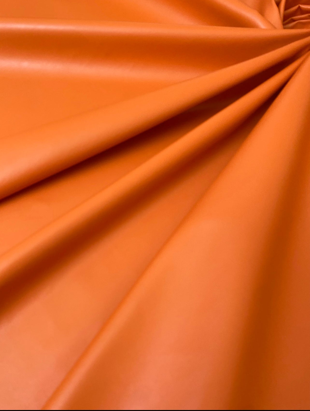 orange stretch Faux Leather, light orange Faux Leather, Faux Leather for jackets, Faux Leather for bags, Faux Leather on discount, Faux Leather on sale, premium Faux Leather, dark orange Faux Leather, pale orange Faux Leather, Faux Leather for tops, Faux Leather for leggings