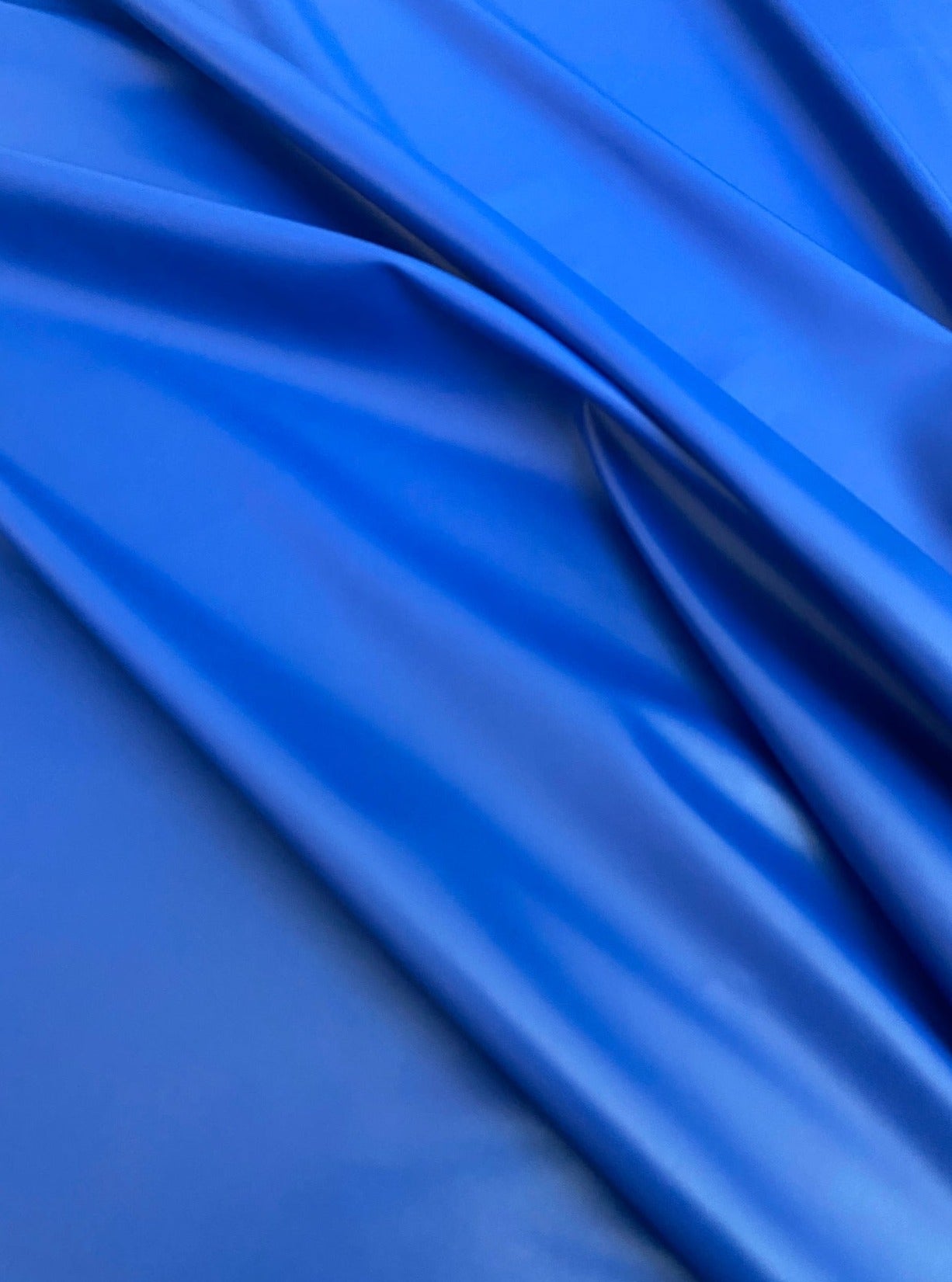 royal blue stretch Faux Leather, light blue faux leather, blue faux leather, dark blue faux leather for woman, faux leather for costumes, faux leather for home decor, 2 way stretch faux leather, leather for blazers, cheap leather, discounted leather, leather on sale