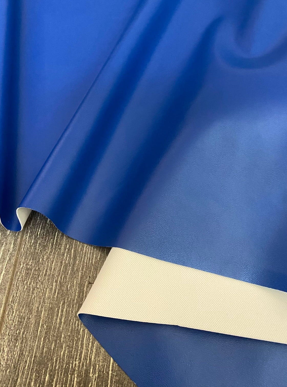 royal blue stretch Faux Leather, light blue faux leather, blue faux leather, dark blue faux leather for woman, faux leather for costumes, faux leather for home decor, 2 way stretch faux leather, leather for blazers, cheap leather, discounted leather, leather on sale